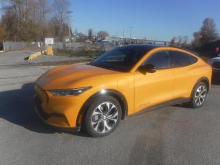 2022 Ford Mustang Mach-E Premium AWD Extended Range Battery, ELECTRIC, 4 door, automatic, AWD, 4-Wheel ABS, cruise control, air conditioning, AM/FM radio, navigation aid, power door locks, power windows, power mirrors, yellow exterior, black interior, leather. This listing is Provincial Tax Exempt. $46,390.00 plus $375 processing fee, $46,765.00 total payment obligation before taxes.  Listing report, warranty, contract commitment cancellation fee, financing available on approved credit (some limitations and exceptions may apply). All above specifications and information is considered to be accurate but is not guaranteed and no opinion or advice is given as to whether this item should be purchased. We do not allow test drives due to theft, fraud and acts of vandalism. Instead we provide the following benefits: Complimentary Warranty (with options to extend), Limited Money Back Satisfaction Guarantee on Fully Completed Contracts, Contract Commitment Cancellation, and an Open-Ended Sell-Back Option. Ask seller for details or call 604-522-REPO(7376) to confirm listing availability.