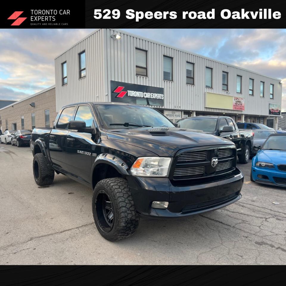 Used 2012 RAM 1500 4WD Crew Cab 140.5