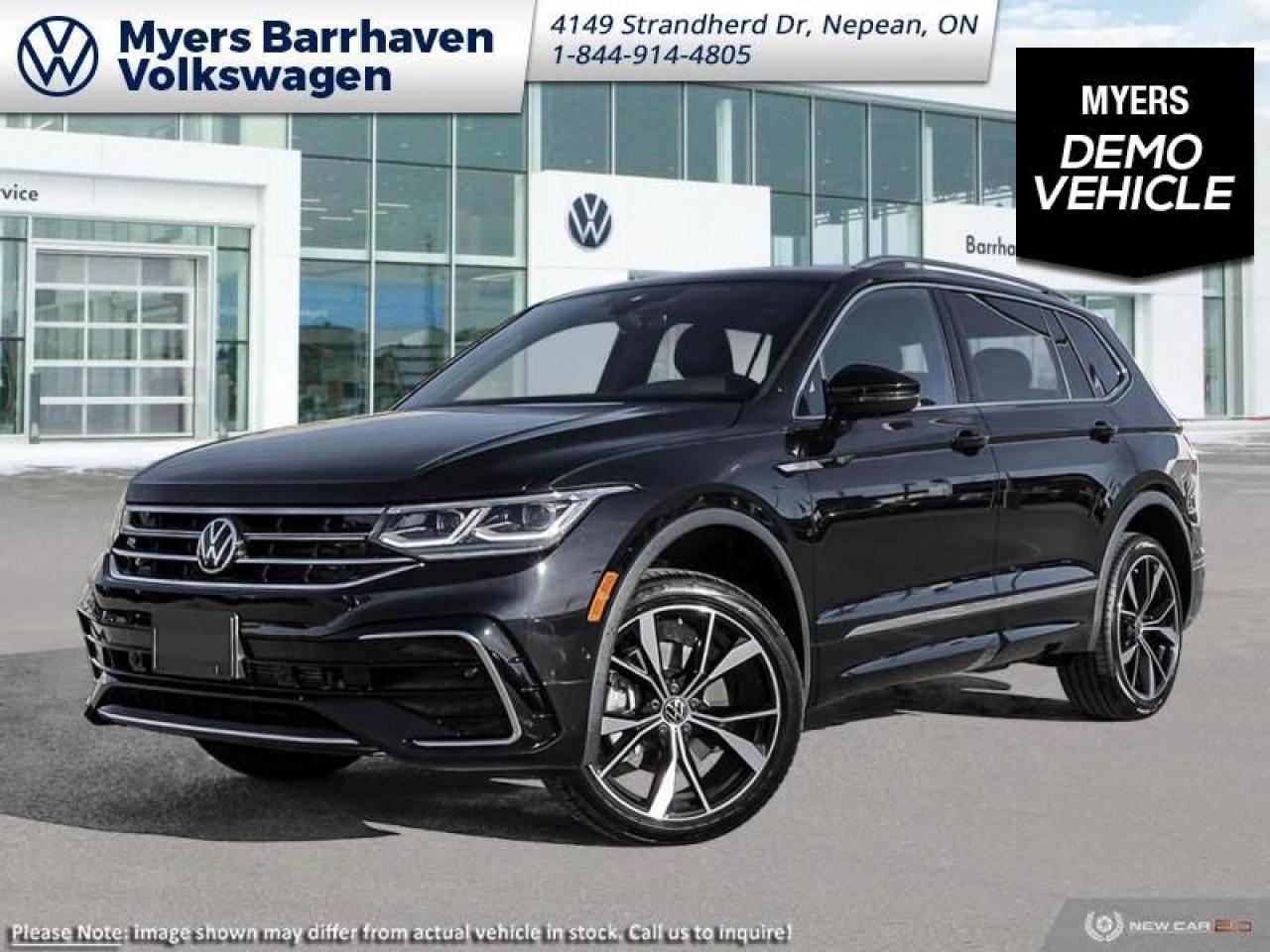 <b>Premium Audio,  Cooled Seats,  Navigation,  360 Camera,  Sunroof!</b><br> <br> <br> <br>  Everything from capacity, capability, comfort, and ease of use was designed with relentless purpose on this 2023 Tiguan. <br> <br>Whether its a weekend warrior or the daily driver this time, this 2024 Tiguan makes every experience easier to manage. Cutting edge tech, both inside the cabin and under the hood, allow for safe, comfy, and connected rides that keep the whole party going. The crossover of the future is already here, and its called the Tiguan.<br> <br> This deep black pearl SUV  has an automatic transmission and is powered by a  2.0L I4 16V GDI DOHC Turbo engine.<br> <br> Our Tiguans trim level is Highline R-Line. This range-topping Tiguan Highline R-Line is fully-loaded with ventilated and heated leather-wrapped seats with power adjustment, lumbar support and memory function, a heated leather-wrapped steering wheel, an 8-speaker Fender audio system with a subwoofer, adaptive cruise control, a 360-camera with aerial view, park distance control with automated parking sensors, and remote engine start. Additional features include an express open/close sunroof with tilt and slide functions and a power sunshade, rain detecting wipers with heated jets, a power liftgate, 4G LTE mobile hotspot internet access, and an 8-inch infotainment screen with satellite navigation, wireless Apple CarPlay and Android Auto, and SiriusXM streaming radio. Safety features also include blind spot detection, lane keep assist, lane departure warning, VW Car-Net Safe & Secure, forward and rear collision mitigation, and autonomous emergency braking. This vehicle has been upgraded with the following features: Premium Audio,  Cooled Seats,  Navigation,  360 Camera,  Sunroof,  Power Liftgate,  Wireless Charging.  This is a demonstrator vehicle driven by a member of our staff and has just 15020 kms.<br><br> <br>To apply right now for financing use this link : <a href=https://www.barrhavenvw.ca/en/form/new/financing-request-step-1/44 target=_blank>https://www.barrhavenvw.ca/en/form/new/financing-request-step-1/44</a><br><br> <br/>    3.99% financing for 84 months. <br> Buy this vehicle now for the lowest bi-weekly payment of <b>$301.65</b> with $0 down for 84 months @ 3.99% APR O.A.C. ( Plus applicable taxes -  $840 Documentation fee. Cash purchase selling price includes: Tire Stewardship ($20.00), OMVIC Fee ($12.50). (HST) are extra. </br>(HST), licence, insurance & registration not included </br>    ).  Incentives expire 2025-01-31.  See dealer for details. <br> <br> <br>LEASING:<br><br>Estimated Lease Payment: $289 bi-weekly <br>Payment based on 4.99% lease financing for 48 months with $0 down payment on approved credit. Total obligation $30,130. Mileage allowance of 16,000 KM/year. Offer expires 2025-01-31.<br><br><br>We are your premier Volkswagen dealership in the region. If youre looking for a new Volkswagen or a car, check out Barrhaven Volkswagens new, pre-owned, and certified pre-owned Volkswagen inventories. We have the complete lineup of new Volkswagen vehicles in stock like the GTI, Golf R, Jetta, Tiguan, Atlas Cross Sport, Volkswagen ID.4 electric vehicle, and Atlas. If you cant find the Volkswagen model youre looking for in the colour that you want, feel free to contact us and well be happy to find it for you. If youre in the market for pre-owned cars, make sure you check out our inventory. If you see a car that you like, contact 844-914-4805 to schedule a test drive.<br> Come by and check out our fleet of 30+ used cars and trucks and 100+ new cars and trucks for sale in Nepean.  o~o