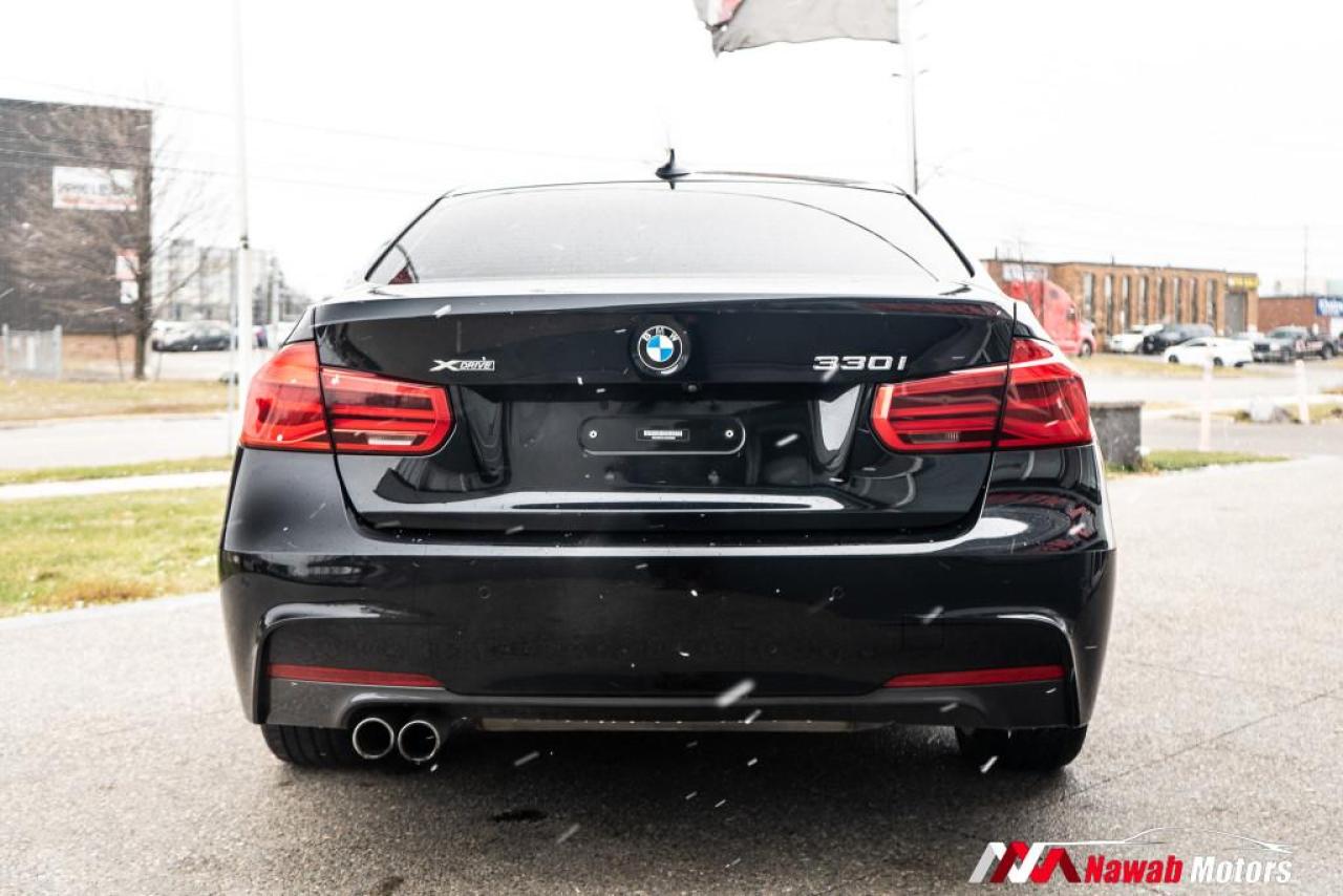 2018 BMW 3 Series 330i xDrive|RED INTERIOR|SUNROOF|BLACK ALLOYS|M STEERING| Photo3