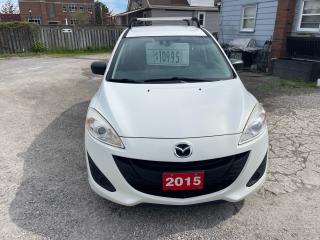<div>2015 Mazda 5 6 passenger minivan white with black interior has clean carfax one owner no accidents reported comes with power windows and locks keyless entry alloys and much more looks and runs great </div>