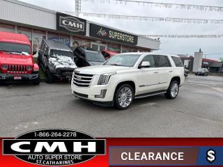 <b>LOW MILEAGE !! NAVIGATION, 360 CAMERA, PARKING SENSORS, COLLISION SENSORS, LANE DEPARTURE, BLIND SPOT, RAIN SENSING WIPERS, REAR DVD, AUTO HIGH BEAM, SUNROOF, LEATHER, POWER SEATS, COOLED/HEATED SEATS, HEATED STEERING WHEEL, POWER LIFTGATE, 22-IN ALLOYS</b><br>      This  2015 Cadillac Escalade is for sale today. <br> <br>This Cadillac Escalade is as stylish and powerful as ever with even more state of the art appointments than ever before. With its blend of luxury, power, and functionality, the Escalade is the perfect choice for those wanting to be pampered while traveling with a crowd. This  SUV has 92,100 kms. Its  white in colour  . It has an automatic transmission and is powered by a   6.2L 8 Cylinder Engine. <br> <br>To apply right now for financing use this link : <a href=https://www.cmhniagara.com/financing/ target=_blank>https://www.cmhniagara.com/financing/</a><br><br> <br/><br>Trade-ins are welcome! Financing available OAC ! Price INCLUDES a valid safety certificate! Price INCLUDES a 60-day limited warranty on all vehicles except classic or vintage cars. CMH is a Full Disclosure dealer with no hidden fees. We are a family-owned and operated business for over 30 years! o~o