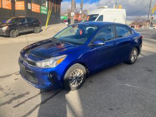 <p>2018 KIA RIO EX WITH SUNROOF  4CYLINDER  1.6LITRE ENGINE AUTOMATIC  APPLE PLAY APPLE CONFIGURATION CRUISE CONTROL HEATED SEATS KEYLESS ENTRY POWER WINDOWS POWER LOCKS POWER MIRRORS POWER TRUNK RELEASE COMES SAFETY CERTIFIED INCLUDED IN THE PRICE .ALL YOU PAY IS PRICE PLUS TAX. YOU CAN CALL US AT 6476275600 TO BOOK AN APPOINTMENT FOR A TEST DRIVE AT 485 ROGERS RD TOROTNO. PLEASE VISIT OUR WEBSITE AT WWW.LETSDOTHISAUTOSALES.CA*** SCHEDULE A TEST DRIVE TODAY!!! OPEN 7 DAYS A WEEK!!! *** </p><p><br />Phone Number : 647 627 56 00 <br /><br /><br /><br />All credit types welcome! Bad/Good/No Credit, bankruptcy, consumer proposal, new to Canada, student. Hassle-free approvals. No matter what your credit situation is, You Are Approved!!! <br /><br /><br /></p><p>Trade-ins Welcome!!!</p><p>Open 7 Days A Week / Mon-Fri 10AM-8PM / Sat 10AM-6PM / Sun 12-5PM / excluding stat holidays</p><p>Lets Do This Auto Sales Inc.</p><p>647-627-5600</p><p>www.letsdothisautosales.ca</p><p>Address: 485 Rogers Rd. York, Ontario</p>