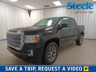 Our bold 2021 GMC Canyon AT4 - Cloth Crew Cab 4X4 in Onyx Black is ready for action and reporting for duty! Motivated by a 3.6 Litre V6 offering 308hp paired with an 8 Speed Automatic transmission so you can manage your days with ease. Well equipped for the trail with a standard off-road suspension, this Four Wheel Drive truck also rewards you with approximately 10.7L/100km on the highway. Our Canyon stands out from the crowd with an exclusive AT4 grille set off by LED lighting, fog lamps, alloy wheels, red recovery hooks, a CornerStep rear bumper, and an EZ Lift and Lower tailgate. Our AT4 - Cloth lives up to its name with comfortable cloth heated front seats, a leather-wrapped steering wheel, automatic climate control, cruise control, remote start, aluminum trim, and technology that comes in handy on the road or off. With an 8-inch touchscreen, Apple CarPlay/Android Auto, Bluetooth, WiFi compatibility, and a six-speaker audio system, you can stay in touch even on the go. GMC helps keep you out of harms way with an HD rearview camera, StabiliTrak with traction control, ABS, advanced airbags, and confidence-inspiring technology for teen drivers. With all that and more, our Canyon AT4 - Cloth keeps on trucking! Save this Page and Call for Availability. We Know You Will Enjoy Your Test Drive Towards Ownership! Steele Chevrolet Atlantic Canadas Premier Pre-Owned Super Center. Being a GM Certified Pre-Owned vehicle ensures this unit has been fully inspected fully detailed serviced up to date and brought up to Certified standards. Market value priced for immediate delivery and ready to roll so if this is your next new to your vehicle do not hesitate. Youve dealt with all the rest now get ready to deal with the BEST! Steele Chevrolet Buick GMC Cadillac (902) 434-4100 Metros Premier Credit Specialist Team Good/Bad/New Credit? Divorce? Self-Employed?
