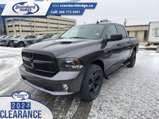 <b>Express Value Package, Sub Zero Package, Mopar Sport Performance Hood, Running Boards , Trailer Hitch!</b><br> <br> <br> <br>  This Ram 1500 Classic is a top contender in the full-size pickup segment thanks to a winning combination of a strong powertrain, a smooth ride and a well-trimmed cabin. <br> <br>The reasons why this Ram 1500 Classic stands above its well-respected competition are evident: uncompromising capability, proven commitment to safety and security, and state-of-the-art technology. From its muscular exterior to the well-trimmed interior, this 2023 Ram 1500 Classic is more than just a workhorse. Get the job done in comfort and style while getting a great value with this amazing full-size truck. <br> <br> This granite crystal metallic Crew Cab 4X4 pickup   has a 8 speed automatic transmission and is powered by a  395HP 5.7L 8 Cylinder Engine.<br> <br> Our 1500 Classics trim level is Express. This Ram 1500 Express features upgraded aluminum wheels, front fog lamps and USB connectivity, along with a great selection of standard features such as class II towing equipment including a hitch, wiring harness and trailer sway control, heavy-duty suspension, cargo box lighting, and a locking tailgate. Additional features include heated and power adjustable side mirrors, UCconnect 3, cruise control, air conditioning, vinyl floor lining, and a rearview camera. This vehicle has been upgraded with the following features: Express Value Package, Sub Zero Package, Mopar Sport Performance Hood, Running Boards , Trailer Hitch. <br><br> View the original window sticker for this vehicle with this url <b><a href=http://www.chrysler.com/hostd/windowsticker/getWindowStickerPdf.do?vin=3C6RR7KTXPG677714 target=_blank>http://www.chrysler.com/hostd/windowsticker/getWindowStickerPdf.do?vin=3C6RR7KTXPG677714</a></b>.<br> <br>To apply right now for financing use this link : <a href=https://standarddodge.ca/financing target=_blank>https://standarddodge.ca/financing</a><br><br> <br/><br>* Visit Us Today *Youve earned this - stop by Standard Chrysler Dodge Jeep Ram located at 208 Cheadle St W., Swift Current, SK S9H0B5 to make this car yours today! <br> Pricing may not reflect additional accessories that have been added to the advertised vehicle<br><br> Come by and check out our fleet of 30+ used cars and trucks and 120+ new cars and trucks for sale in Swift Current.  o~o
