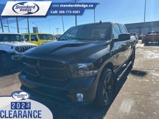 <b>Express Value Package, Sub Zero Package, Mopar Sport Performance Hood, Running Boards , Trailer Hitch!</b><br> <br> <br> <br>  Reliable, dependable, and innovative, this Ram 1500 Classic proves that it has what it takes to get the job done right. <br> <br>The reasons why this Ram 1500 Classic stands above its well-respected competition are evident: uncompromising capability, proven commitment to safety and security, and state-of-the-art technology. From its muscular exterior to the well-trimmed interior, this 2023 Ram 1500 Classic is more than just a workhorse. Get the job done in comfort and style while getting a great value with this amazing full-size truck. <br> <br> This diamond black crystal pearlcoat Crew Cab 4X4 pickup   has a 8 speed automatic transmission and is powered by a  395HP 5.7L 8 Cylinder Engine.<br> <br> Our 1500 Classics trim level is Express. This Ram 1500 Express features upgraded aluminum wheels, front fog lamps and USB connectivity, along with a great selection of standard features such as class II towing equipment including a hitch, wiring harness and trailer sway control, heavy-duty suspension, cargo box lighting, and a locking tailgate. Additional features include heated and power adjustable side mirrors, UCconnect 3, cruise control, air conditioning, vinyl floor lining, and a rearview camera. This vehicle has been upgraded with the following features: Express Value Package, Sub Zero Package, Mopar Sport Performance Hood, Running Boards , Trailer Hitch. <br><br> View the original window sticker for this vehicle with this url <b><a href=http://www.chrysler.com/hostd/windowsticker/getWindowStickerPdf.do?vin=3C6RR7KT4PG677711 target=_blank>http://www.chrysler.com/hostd/windowsticker/getWindowStickerPdf.do?vin=3C6RR7KT4PG677711</a></b>.<br> <br>To apply right now for financing use this link : <a href=https://standarddodge.ca/financing target=_blank>https://standarddodge.ca/financing</a><br><br> <br/><br>* Visit Us Today *Youve earned this - stop by Standard Chrysler Dodge Jeep Ram located at 208 Cheadle St W., Swift Current, SK S9H0B5 to make this car yours today! <br> Pricing may not reflect additional accessories that have been added to the advertised vehicle<br><br> Come by and check out our fleet of 30+ used cars and trucks and 120+ new cars and trucks for sale in Swift Current.  o~o