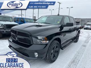 <b>Express Value Package, Sub Zero Package, Mopar Sport Performance Hood, Running Boards , Trailer Hitch!</b><br> <br> <br> <br>  This Ram 1500 Classic is a top contender in the full-size pickup segment thanks to a winning combination of a strong powertrain, a smooth ride and a well-trimmed cabin. <br> <br>The reasons why this Ram 1500 Classic stands above its well-respected competition are evident: uncompromising capability, proven commitment to safety and security, and state-of-the-art technology. From its muscular exterior to the well-trimmed interior, this 2023 Ram 1500 Classic is more than just a workhorse. Get the job done in comfort and style while getting a great value with this amazing full-size truck. <br> <br> This diamond black crystal pearlcoat Crew Cab 4X4 pickup   has a 8 speed automatic transmission and is powered by a  395HP 5.7L 8 Cylinder Engine.<br> <br> Our 1500 Classics trim level is Express. This Ram 1500 Express features upgraded aluminum wheels, front fog lamps and USB connectivity, along with a great selection of standard features such as class II towing equipment including a hitch, wiring harness and trailer sway control, heavy-duty suspension, cargo box lighting, and a locking tailgate. Additional features include heated and power adjustable side mirrors, UCconnect 3, cruise control, air conditioning, vinyl floor lining, and a rearview camera. This vehicle has been upgraded with the following features: Express Value Package, Sub Zero Package, Mopar Sport Performance Hood, Running Boards , Trailer Hitch. <br><br> View the original window sticker for this vehicle with this url <b><a href=http://www.chrysler.com/hostd/windowsticker/getWindowStickerPdf.do?vin=3C6RR7KT6PG677712 target=_blank>http://www.chrysler.com/hostd/windowsticker/getWindowStickerPdf.do?vin=3C6RR7KT6PG677712</a></b>.<br> <br>To apply right now for financing use this link : <a href=https://standarddodge.ca/financing target=_blank>https://standarddodge.ca/financing</a><br><br> <br/><br>* Visit Us Today *Youve earned this - stop by Standard Chrysler Dodge Jeep Ram located at 208 Cheadle St W., Swift Current, SK S9H0B5 to make this car yours today! <br> Pricing may not reflect additional accessories that have been added to the advertised vehicle<br><br> Come by and check out our fleet of 30+ used cars and trucks and 120+ new cars and trucks for sale in Swift Current.  o~o