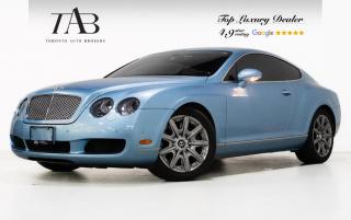 This beautiful 2005 Bentley Continental GT is a local Ontario vehicle with a clean Carfax report. With a commanding V12 engine under its hood, it effortlessly blends power with opulence. The sophisticated cabin boasts a luxurious touchscreen interface, seamlessly integrating cutting-edge technology with the traditional craftsmanship that defines Bentley. 

Key features Include:

- V12 Engine
- Blue dual tone Handcrafted leather upholstery
- Touchscreen Infotainment
- Premium Audio System
- Climate Control
- Heated Seats
- Parking Sensors
- Keyless Entry
- Cruise Control
- Multifunction Steering Wheel
- Memory Seats
- Bluetooth Connectivity
- Cruise Control
- Keyless Entry
- Alloy Wheels

NOW OFFERING 3 MONTH DEFERRED FINANCING PAYMENTS ON APPROVED CREDIT. 

Looking for a top-rated pre-owned luxury car dealership in the GTA? Look no further than Toronto Auto Brokers (TAB)! Were proud to have won multiple awards, including the 2023 GTA Top Choice Luxury Pre Owned Dealership Award, 2023 CarGurus Top Rated Dealer, 2024 CBRB Dealer Award, the Canadian Choice Award 2024, the 2023 Three Best Rated Dealer Award, and many more!

With 30 years of experience serving the Greater Toronto Area, TAB is a respected and trusted name in the pre-owned luxury car industry. Our 30,000 sq.Ft indoor showroom is home to a wide range of luxury vehicles from top brands like BMW, Mercedes-Benz, Audi, Porsche, Land Rover, Jaguar, Aston Martin, Bentley, Maserati, and more. And we dont just serve the GTA, were proud to offer our services to all cities in Canada, including Vancouver, Montreal, Calgary, Edmonton, Winnipeg, Saskatchewan, Halifax, and more.

At TAB, were committed to providing a no-pressure environment and honest work ethics. As a family-owned and operated business, we treat every customer like family and ensure that every interaction is a positive one. Come experience the TAB Lifestyle at its truest form, luxury car buying has never been more enjoyable and exciting!

We offer a variety of services to make your purchase experience as easy and stress-free as possible. From competitive and simple financing and leasing options to extended warranties, aftermarket services, and full history reports on every vehicle, we have everything you need to make an informed decision. We welcome every trade, even if youre just looking to sell your car without buying, and when it comes to financing or leasing, we offer same day approvals, with access to over 50 lenders, including all of the banks in Canada. Feel free to check out your own Equifax credit score without affecting your credit score, simply click on the Equifax tab above and see if you qualify.

So if youre looking for a luxury pre-owned car dealership in Toronto, look no further than TAB! We proudly serve the GTA, including Toronto, Etobicoke, Woodbridge, North York, York Region, Vaughan, Thornhill, Richmond Hill, Mississauga, Scarborough, Markham, Oshawa, Peteborough, Hamilton, Newmarket, Orangeville, Aurora, Brantford, Barrie, Kitchener, Niagara Falls, Oakville, Cambridge, Kitchener, Waterloo, Guelph, London, Windsor, Orillia, Pickering, Ajax, Whitby, Durham, Cobourg, Belleville, Kingston, Ottawa, Montreal, Vancouver, Winnipeg, Calgary, Edmonton, Regina, Halifax, and more.

Call us today or visit our website to learn more about our inventory and services. And remember, all prices exclude applicable taxes and licensing, and vehicles can be certified at an additional cost of $699.