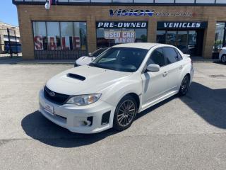 2013 Subuaru Impreza WRX, a Great Choice for a Performance Commuter !<br><br>GREAT CONDITION, this 2013 Subaru WRX comes with a 2.5 LITRE 4 CYLINDER ENGINE that puts out 265 HORSEPOWER.<br><br>Well reviewed:  The 2013 Subaru Impreza WRX offers an impressive amount of performance for the money, featuring plentiful power and tenacious cornering grip thanks to its firm suspension and summer performance tires,  (edumunds.com).<br><br> It was certainly a pleasure driving the 2013 Subaru WRX. Between its great handling, pleasant inputs (albeit the flaky steering wheel) and freight train torque, I thoroughly understand and support the WRX/STI hype. It offers a great combination of canyon cruiser, straight-line rocket, and comfortable daily/road tripper,  (tracktuned.com).<br><br>ALL WHEEL DRIVE !<br><br>MANUAL !<br><br>Comes complete with power locks, power windows, and keyless remote entry.<br><br>This car has safety included in the advertised price.<br><br>Please Note: HST and Licensing is an additional fee separate from the advertised price. <br><br>We have a strong confidence in our cars, if you want to have a car inspected, Vision Fine Cars welcomes it.<br>  <br>Certain Crypto-Currency accepted as payment, Charges will apply.<br>
