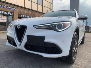 SPRING SPECIALS >>> PRICES REDUCED ,<br><br>Remarkably fun to drive and beautiful too, the 2018 Alfa Romeo Stelvio is great at driving SUV.  For its gorgeous styling, impressive performance, charming driving character, and lengthy list of standard equipment, we rate the 2018 Alfa Romeo Stelvio  a Top rated SUV. <br><br>Gorgeous FULLY LOADED  ALFA STELVIO TI AWD comes FULLY LOADED. <br><br>Factory Options include. NAVIGATION >>> PANORAMIC SUNROOF >>> BACK -UP CAMERA >>> LEATHER INTERIOR >>> HEATED SEATS >>> BLIND SPOT MONITORING >>> FRONT AND REAR COLLISION AVOIDENCE>>> LANE KEEP ASSIST>>>  POWER TAILGATE >> KEYLESS ENTRY >>> DUAL CLIMATE CONTROL >>> REMOTE START >>> PARKING SENORS and so much more.  <br><br>FINISHED in GLACIER WHITE with BLACK LEATHER INTERIOR. <br><br>The Alfa Stelvio comes equipped with a 2.0-liter turbo-4 builds 280 horsepower and 306 pound-feet of torque in base and Ti models. Performance is strong from a standstill and up through redline, with the broad, flat torque curve kicking the nearly 4,000-pound crossover in the pants whenever its necessary. The Stelvio can hit 60 faster than any other similar crossover modes l in the segment, arriving there in 5.4 seconds before hitting a 144-mph top speed.  Alfa Romeo engineered a real dancer with the Stelvio, offering very fast steering and a tight, agile suspension. Brilliant paddle shifters, meanwhile, keep drivers engaged<br><br>The 2.0-liters partner in crime is ZFs fantastic 8-speed automatic transmission. Its an unobtrusive transmission when the DNA drive mode selector is in Natural, kicking down as needed and holding gears where appropriate. Its good in Advanced Efficiency, short-shifting along to save fuel. The transmissions potential comes to full life in Dynamic mode<br><br>*** Dollar-for-dollar, the 2018 Alfa Romeo Stelvio is one of the most capable, dynamic, and fun-to-drive crossover SUVs on the market. ****<br><br>Come Test drive this Suv today and compare the difference.