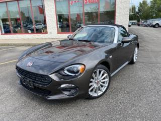 2017 Fiat 124 Spider Lusso Bronzo Magnetico Titanium<br><br>**50TH ANNIVERSARY DASH PLAQUE #92 OF 124 PRODUCED FOR Canada**<br><br>NAVIGATION*, *BLUETOOTH*, *CLEAN CARFAX REPORT*, *AUTOMATIC*, *MARKET VALUE PRICING*, *BLIND SPOT DETECTION*, *BACK UP CAMERA   REAR SENSORS*, *NICE UNIROYAL TIRES*, *HEATED SADDLE LEATHER*, , 1-Year Sirius Radio Service, 9 Bose Speakers w/Subwoofer, ABS brakes, Adaptive Front Headlamps, Auto-Dimming Exterior Mirrors, Auto-Dimming Rear-View Mirror, Automatic Headlamp Levelling System, Blind-Spot/Rear Cross-Path Detection, Electronic Stability Control, GPS Navigation, Headlamp Washer, Heated Exterior Mirrors, Heated front seats, Illuminated entry, LED Daytime Running Lamps, LED Headlamps, Low tire pressure warning, Park-Sense Rear Park Assist System, ParkView Rear Back-Up Camera, Premium Collection, Prima Edizione Package, Quick Order Package 22S, Remote keyless entry, Safety & Comfort Collection, Security Alarm, Serialized Dash Plaque, SiriusXM Satellite Radio, Traction control, Universal Garage Door Opener, Wheels: 17  x 7  Lounge Silver Aluminum.<br><br>Vision Fine cars is a well established dealer, being in business for well over 20 years. We pride ourselves on how we maintain relationships with our clients, making customer service our first priority. We always aim to keep our large indoor showroom stocked with a diverse inventory, containing the right car for any type of customer. If financing is needed, we provide on the spot financing on all makes and vehicle models. We welcome you to give us a call, take a look online, or come to our establishment at 5161 steeles avenue west to take a look at what we have. Looking forward to seeing you !<br>