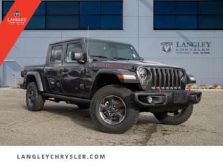 <p><strong><span style=font-family:Arial; font-size:16px;>Prepare to redefine your driving experience with this sophisticated, brand new 2023 Jeep Gladiator Rubicon pickup from Langley Chrysler..</span></strong></p> <p><strong><span style=font-family:Arial; font-size:16px;>Bathed in a sleek grey exterior and accented by a luxurious black interior, this vehicle is a harmonious blend of style, comfort, and power..</span></strong> <br> Featuring a formidable 3.0L 6 cylinder engine paired with an 8-speed automatic transmission, this Gladiator Rubicon is a testament to Jeeps unmatched engineering.. Its unblemished condition asserts that it has never been driven, its journey with you is yet to begin.</p> <p><strong><span style=font-family:Arial; font-size:16px;>This pickup is packed with features that are designed to enhance your driving experience..</span></strong> <br> With traction control, a navigation system, and a tachometer, the Gladiator Rubicon is ready to lead you on any terrain.. And with comforts such as air conditioning, power windows, and steering, this vehicle ensures that you will travel in absolute comfort.</p> <p><strong><span style=font-family:Arial; font-size:16px;>Safety is paramount in this Gladiator..</span></strong> <br> From ABS brakes to dual front impact airbags, electronic stability, and an integrated roll-over protection, this Jeep has been designed to keep you and your passengers safe.. The auto-dimming rearview mirror and delay-off headlights are additional features designed to assist you during your journey.</p> <p><strong><span style=font-family:Arial; font-size:16px;>The interior boasts a premium black cloth finish, manual driver lumbar support, and a crew cab configuration..</span></strong> <br> The vehicle is also equipped with a trailer hitch receiver, ready to haul anything your adventures require.. Now, heres a riddle for the road.</p> <p><strong><span style=font-family:Arial; font-size:16px;>What is always ahead of you but you can never reach? The answer is the horizon..</span></strong> <br> And with this 2023 Jeep Gladiator Rubicon, the horizon is not a limit but an invitation.. At Langley Chrysler, we believe that you shouldnt just love your car, you should love buying it.</p> <p><strong><span style=font-family:Arial; font-size:16px;>Our team is dedicated to providing a seamless buying experience, ensuring that this Gladiator stands out from the competition..</span></strong> <br> So, are you ready to redefine your driving experience? Come down to Langley Chrysler, where this brand new 2023 Jeep Gladiator Rubicon is waiting for its first adventure with you</p>Documentation Fee $968, Finance Placement $628, Safety & Convenience Warranty $699

<p>*All prices are net of all manufacturer incentives and/or rebates and are subject to change by the manufacturer without notice. All prices plus applicable taxes, applicable environmental recovery charges, documentation of $599 and full tank of fuel surcharge of $76 if a full tank is chosen.<br />Other items available that are not included in the above price:<br />Tire & Rim Protection and Key fob insurance starting from $599<br />Service contracts (extended warranties) for up to 7 years and 200,000 kms starting from $599<br />Custom vehicle accessory packages, mudflaps and deflectors, tire and rim packages, lift kits, exhaust kits and tonneau covers, canopies and much more that can be added to your payment at time of purchase<br />Undercoating, rust modules, and full protection packages starting from $199<br />Flexible life, disability and critical illness insurances to protect portions of or the entire length of vehicle loan?im?im<br />Financing Fee of $500 when applicable<br />Prices shown are determined using the largest available rebates and incentives and may not qualify for special APR finance offers. See dealer for details. This is a limited time offer.</p>