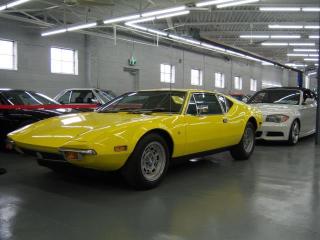 This Beautiful DeTomaso Pantera was built in Modena Italy, Designed by Tom Tjaarda at Ghia and Marcello Gandini is a 2 Door Sports Car Mid Engine Rear Wheel Drive powered by a 5.8L (351) Ford Cleveland V8 producing 330Hp.  Built May 1972, and is Pantera unit number 3594.  Original release Sept 1972, Sold June 22 1973.   Statistics this car is 1 of:  2131 Produced,  171 Produced in May 1972,  2131 Ordered as Standard Models,  558 Painted in Yellow Color, and total of 46 Units ordered for delivery to the Buffalo District Sales Office this one was delivered from Carl Foss Lincoln-Mercury in Rochester NY.