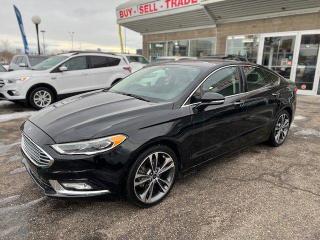 <div>2018 FORD FUSION TITANIUM WITH LOW 56655 KMS, ALL WHEEL DRIVE, BACKUP CAMERA, PUSH TO START BUTTON, BLUETOOTH, USB/AUX, PADDLE SHIFTERS, LANE ASSIST, LEATHER HEATED AND COOLED FRONT SEATS, SUNROOF, CD/RADIO, AC, POWER WINDOW LOCKS SEATS AND MORE!</div>