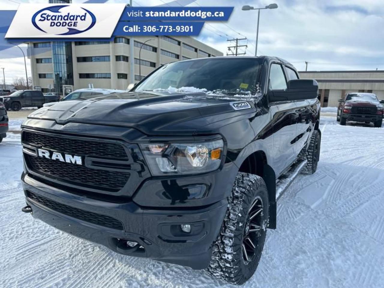 <b>5.7L V8 HEMI MDS VVT eTorque Engine, Tradesman Level 1 Equipment Group, Sport Appearance Package, Trailer Tow Group, Running Boards!</b><br> <br> <br> <br>  Beauty meets brawn with this rugged Ram 1500. Includes 4 x Gatorback Mud Flaps!<br> <br> This diamond black crystal pearlcoat Crew Cab 4X4 pickup   has a 8 speed automatic transmission and is powered by a  395HP 5.7L 8 Cylinder Engine.<br> <br> Our 1500s trim level is Tradesman. This Ram 1500 Tradesman is ready for whatever you throw at it, with a great selection of standard features such as class II towing equipment including a hitch, wiring harness and trailer sway control, heavy-duty suspension, cargo box lighting, and a locking tailgate. Additional features include heated and power adjustable side mirrors, UCconnect 3, push button start, cruise control, air conditioning, vinyl floor lining, and a rearview camera. This vehicle has been upgraded with the following features: 5.7l V8 Hemi Mds Vvt Etorque Engine, Tradesman Level 1 Equipment Group, Sport Appearance Package, Trailer Tow Group, Running Boards. <br><br> View the original window sticker for this vehicle with this url <b><a href=http://www.chrysler.com/hostd/windowsticker/getWindowStickerPdf.do?vin=1C6SRFGT8RN199677 target=_blank>http://www.chrysler.com/hostd/windowsticker/getWindowStickerPdf.do?vin=1C6SRFGT8RN199677</a></b>.<br> <br>To apply right now for financing use this link : <a href=https://standarddodge.ca/financing target=_blank>https://standarddodge.ca/financing</a><br><br> <br/><br>* Visit Us Today *Youve earned this - stop by Standard Chrysler Dodge Jeep Ram located at 208 Cheadle St W., Swift Current, SK S9H0B5 to make this car yours today! <br> Pricing may not reflect additional accessories that have been added to the advertised vehicle<br> o~o