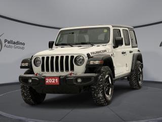 <b>Low Mileage, Off-Road Suspension,  4G Wi-Fi,  Android Auto,  Apple CarPlay,  Navigation!</b><br> <br>    This ultra capable Jeep Wrangler Unlimited was built to be tough and reliable, with next level comfort and convenience. This  2021 Jeep Wrangler Unlimited is for sale today in Sudbury. <br> <br>No matter where your next adventure takes you, this Jeep Wrangler Unlimited is ready for the challenge. With advanced traction and handling capability, sophisticated safety features and ample ground clearance, the Wrangler is designed to climb up and crawl over the toughest terrain. Inside the cabin of this Wrangler Unlimited offers supportive seats and comes loaded with the technology you expect while staying loyal to the style and design youve come to know and love.This low mileage  SUV has just 12,089 kms. Its  bright white in colour  . It has an automatic transmission and is powered by a  3.6L V6 24V MPFI DOHC engine.  This unit has some remaining factory warranty for added peace of mind. <br> <br> Our Wrangler Unlimiteds trim level is Rubicon. This Rubicon is as tough as they come with aluminum wheels, red tow hooks, performance suspension, selectable locking differentials, more skid plates, heavy duty shocks, off road suspension, black exterior accents, remote keyless entry, voice activated air conditioning, Rubicon logo on seats, navigation, off road information pages, and wi-fi. It also comes with Uconnect4, voice activation, Android Auto, Apple CarPlay, Trail Rated badge, and a rear view camera. This vehicle has been upgraded with the following features: Off-road Suspension,  4g Wi-fi,  Android Auto,  Apple Carplay,  Navigation,  4g Wi-fi,  Fog Lamps. <br> To view the original window sticker for this vehicle view this <a href=http://www.chrysler.com/hostd/windowsticker/getWindowStickerPdf.do?vin=1C4HJXFG5MW736979 target=_blank>http://www.chrysler.com/hostd/windowsticker/getWindowStickerPdf.do?vin=1C4HJXFG5MW736979</a>. <br/><br> <br>To apply right now for financing use this link : <a href=https://www.palladinohonda.com/finance/finance-application target=_blank>https://www.palladinohonda.com/finance/finance-application</a><br><br> <br/><br>Palladino Honda is your ultimate resource for all things Honda, especially for drivers in and around Sturgeon Falls, Elliot Lake, Espanola, Alban, and Little Current. Our dealership boasts a vast selection of high-class, top-quality Honda models, as well as expert financing advice and impeccable automotive service. These factors arent what set us apart from other dealerships, though. Rather, our uncompromising customer service and professionalism make every experience unforgettable, and keeps drivers coming back. The advertised price is for financing purchases only. All cash purchases will be subject to an additional surcharge of $2,501.00. This advertised price also does not include taxes and licensing fees.<br> Come by and check out our fleet of 120+ used cars and trucks and 60+ new cars and trucks for sale in Sudbury.  o~o