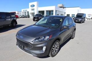 <p>000KMS!! This 2020 Ford Escape Hybrid Titanium comes equipped with: 

--> Panoramic Vista Roof 
--> Cargo Mat 
--> Front & Rear Floor Mats 
--> Easy Access Cargo Shade 
--> Universal Garage Door Opener 
--> Remote Vehicle Start 
--> Heated Steering Wheel 
--> Reverse Camera & Sensing System 
--> B&O Audio & so much more!! 


To enjoy the full Petrie Ford experience</p>
<a href=http://www.petrieford.com/used/Ford-Escape_Hybrid-2020-id10302800.html>http://www.petrieford.com/used/Ford-Escape_Hybrid-2020-id10302800.html</a>