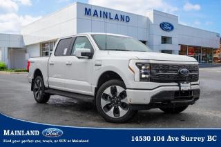 <p><strong><span style=font-family:Arial; font-size:18px;>Intriguing from the first turn of the key, our automotive selection at Mainland Ford effortlessly commands attention..</span></strong></p> <p><strong><span style=font-family:Arial; font-size:18px;>Today, were delighted to introduce you to the brand-new 2023 Ford F-150 Lightning Platinum..</span></strong> <br> This pickup is not just a vehicle; its an expression of innovation and grandeur, wrapped in a stunning White exterior and a luxurious Black interior.. The F-150 Lightning Platinum 710A model comes with an extended range, a moonroof for those clear sky nights, and a 360-degree camera that offers a comprehensive view of your surroundings.</p> <p><strong><span style=font-family:Arial; font-size:18px;>Its not just about utility; its about unparalleled comfort and the thrill of driving a vehicle thats never been driven before..</span></strong> <br> The captivating B&O audio system provides a concert-like experience right inside your pickup.. As you glide on the roads, the electric engine ensures a seamless, eco-friendly ride.</p> <p><strong><span style=font-family:Arial; font-size:18px;>With a 1-Speed Automatic transmission, you are in command of an effortless driving experience..</span></strong> <br> This F-150 Lightning Platinum is endowed with features crafted for comfort and safety.. Adjustable pedals, traction control, and a navigation system are just the beginning.</p> <p><strong><span style=font-family:Arial; font-size:18px;>Add to this a compass, ABS brakes, air conditioning, power windows and steering, and youve got a vehicle that prioritizes your convenience..</span></strong> <br> The leather upholstery exudes elegance, and the auto-dimming rearview mirror and automatic temperature control are evidence of the attention paid to every detail in this state-of-the-art machine.. But heres a fun fact: this fantastic pickup is also equipped with a massaging driver lumbar support! Talk about luxury at its finest.</p> <p><strong><span style=font-family:Arial; font-size:18px;>This feature, combined with ventilated front seats, ensures that every journey is as comfortable as it is exciting..</span></strong> <br> At Mainland Ford, we understand that every customer is unique, and thats why we speak your language.. Were here to make your car buying experience smooth, enjoyable, and memorable.</p> <p><strong><span style=font-family:Arial; font-size:18px;>With the new 2023 Ford F-150 Lightning Platinum, youre not just buying a vehicle; youre investing in a lifestyle of elegance, comfort, and cutting-edge technology..</span></strong> <br> Come and experience this never-driven marvel today at Mainland Ford.. Your brand-new adventure awaits</p><hr />
<p><br />
To apply right now for financing use this link : <a href=https://www.mainlandford.com/credit-application/ target=_blank>https://www.mainlandford.com/credit-application/</a><br />
<br />
Book your test drive today! Mainland Ford prides itself on offering the best customer service. We also service all makes and models in our World Class service center. Come down to Mainland Ford, proud member of the Trotman Auto Group, located at 14530 104 Ave in Surrey for a test drive, and discover the difference!<br />
<br />
***All vehicle sales are subject to a $599 Documentation Fee, $149 Fuel Surcharge, $599 Safety and Convenience Fee, $500 Finance Placement Fee plus applicable taxes***<br />
<br />
VSA Dealer# 40139</p>

<p>*All prices are net of all manufacturer incentives and/or rebates and are subject to change by the manufacturer without notice. All prices plus applicable taxes, applicable environmental recovery charges, documentation of $599 and full tank of fuel surcharge of $76 if a full tank is chosen.<br />Other items available that are not included in the above price:<br />Tire & Rim Protection and Key fob insurance starting from $599<br />Service contracts (extended warranties) for up to 7 years and 200,000 kms<br />Custom vehicle accessory packages, mudflaps and deflectors, tire and rim packages, lift kits, exhaust kits and tonneau covers, canopies and much more that can be added to your payment at time of purchase<br />Undercoating, rust modules, and full protection packages<br />Flexible life, disability and critical illness insurances to protect portions of or the entire length of vehicle loan?im?im<br />Financing Fee of $500 when applicable<br />Prices shown are determined using the largest available rebates and incentives and may not qualify for special APR finance offers. See dealer for details. This is a limited time offer.</p>