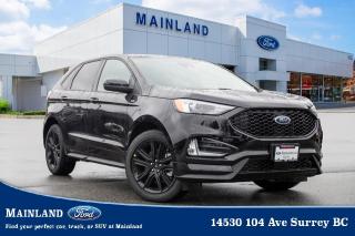<p><strong><span style=font-family:Arial; font-size:18px;>Escape the mundane in a machine thats anything but ordinary..</span></strong></p> <p><strong><span style=font-family:Arial; font-size:18px;>Unveiling the 2024 Ford Edge ST Line - a marvel of craftsmanship thats as stunning as it is powerful..</span></strong> <br> This brand-new SUV, fresh from the production line, still awaits its first adventure on the open road.. With a sleek black exterior that mirrors the night sky, this Ford Edge exudes an air of mystery and sophistication.</p> <p><strong><span style=font-family:Arial; font-size:18px;>Step inside, and you are greeted by a plush black interior, designed for comfort and style..</span></strong> <br> The panoramic roof offers breathtaking views, transforming every journey into a scenic adventure.. The power liftgate and tow package enhance convenience, while the spoiler and traction control combine to deliver an exhilarating, yet stable driving experience.</p> <p><strong><span style=font-family:Arial; font-size:18px;>The Edge is equipped with an 8-speed automatic transmission and a 2.0L 4-cylinder engine, offering impressive power and efficiency..</span></strong> <br> This SUV is more than just a vehicle; its a commitment to safety.. Equipped with ABS brakes, airbags, electronic stability, and brake assist, each drive is as secure as it is exciting.</p> <p><strong><span style=font-family:Arial; font-size:18px;>A host of other features, including power windows, automatic temperature control, and an auto-dimming rearview mirror, ensure a comfortable and convenient ride..</span></strong> <br> At Mainland Ford, we believe in the power of communication.. Thats why, We Speak Your Language. We are committed to making your buying experience as smooth and enjoyable as possible.</p> <p><strong><span style=font-family:Arial; font-size:18px;>The 2024 Ford Edge ST Line is not just a vehicle; its a lifestyle choice..</span></strong> <br> As Henry Ford once said, When everything seems to be going against you, remember that the airplane takes off against the wind, not with it. So, break free from the ordinary and elevate your driving experience with this extraordinary SUV.. Visit us at Mainland Ford and discover the unique features that set the 2024 Ford Edge ST Line apart from the competition.</p> <p><strong><span style=font-family:Arial; font-size:18px;>Experience the thrill of driving a brand-new vehicle, untouched and ready to conquer the road..</span></strong></p><hr />
<p><br />
To apply right now for financing use this link : <a href=https://www.mainlandford.com/credit-application/ target=_blank>https://www.mainlandford.com/credit-application/</a><br />
<br />
Book your test drive today! Mainland Ford prides itself on offering the best customer service. We also service all makes and models in our World Class service center. Come down to Mainland Ford, proud member of the Trotman Auto Group, located at 14530 104 Ave in Surrey for a test drive, and discover the difference!<br />
<br />
***All vehicle sales are subject to a $599 Documentation Fee, $149 Fuel Surcharge, $599 Safety and Convenience Fee, $500 Finance Placement Fee plus applicable taxes***<br />
<br />
VSA Dealer# 40139</p>

<p>*All prices are net of all manufacturer incentives and/or rebates and are subject to change by the manufacturer without notice. All prices plus applicable taxes, applicable environmental recovery charges, documentation of $599 and full tank of fuel surcharge of $76 if a full tank is chosen.<br />Other items available that are not included in the above price:<br />Tire & Rim Protection and Key fob insurance starting from $599<br />Service contracts (extended warranties) for up to 7 years and 200,000 kms<br />Custom vehicle accessory packages, mudflaps and deflectors, tire and rim packages, lift kits, exhaust kits and tonneau covers, canopies and much more that can be added to your payment at time of purchase<br />Undercoating, rust modules, and full protection packages<br />Flexible life, disability and critical illness insurances to protect portions of or the entire length of vehicle loan?im?im<br />Financing Fee of $500 when applicable<br />Prices shown are determined using the largest available rebates and incentives and may not qualify for special APR finance offers. See dealer for details. This is a limited time offer.</p>