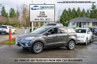 <p>Local BC 4x4 Ford Escape SE well equipped with Bluetooth, Backup Cam with large factory touch screen, all of the power options, alloy wheels and more.</p><br><p>Excellent, Affordable Lubrico Warranty Options Available on ALL Vehicles!</p>
<p>604-585-1831</p>
<p>All Vehicles are Safety Inspected by a 3rd Party Inspection Service. <br /> <br />We speak English, French, German, Punjabi, Hindi and Urdu Language! </p>
<p><br />We are proud to have sold over 14,500 vehicles to our customers throughout B.C.<br /> <br />What Makes Us Different? <br />All of our vehicles have been sent to us from new car dealerships. They are all trade-ins and we are a large remarketing centre for the lower mainland new car dealerships. We do not purchase vehicles at auctions or from private sales. <br /> <br />Administration Fee of $375<br /> <br />Disclaimer: <br />Vehicle options are inputted from a VIN decoder. As we make our best effort to ensure all details are accurate we can not guarantee the information that is decoded from the VIN. Please verify any options before purchasing the vehicle. <br /> <br />B.C. Dealers Trade-In Centre <br />14458 104th Ave. <br />Surrey, BC <br />V3R1L9 <br />DL# 26220 <br /> <br />(604) 585-1831</p>