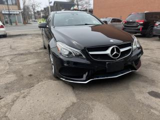 <div><span>2014 Mercedes-Benz E350 Coupe 4MATIC</span></div><br /><div><span>Mileage:</span> 106,300 km</div><br /><div><span>Features:</span></div><ul><li>All-wheel drive (4MATIC)</li><li>Heated seats</li><li>Leather interior with wood trim</li><li>Memory seats</li><li>Remote keyless entry</li><li>Smart Active Cornering Lights</li></ul><br /><div><span>Description:</span> This 2014 Mercedes-Benz E350 Coupe 4MATIC offers a luxurious driving experience with its extensive feature set. From the comfort of heated leather seats to the elegance of wood trim interior, every detail exudes sophistication. With memory seats, remote keyless entry, and Smart Active Cornering Lights, this coupe delivers convenience and safety in one sleek package.</div><br /><div><span>Contact Information:</span> Garage Plus Auto Centre Phone: +1(613)762-5224 Website: garageplusautocentre.com Address: 1201 Bank Street Ottawa K1s 3x7</div>