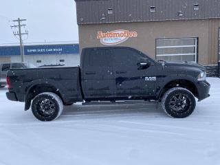 Used 2014 RAM 1500 SPORT QUAD CAB 4WD for sale in Stettler, AB