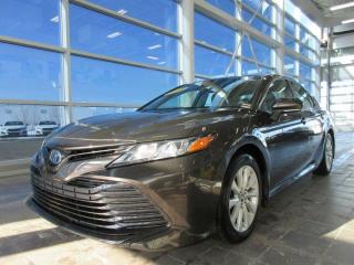 ********Special Finance price of $27287. ************************* Cash Price on this Camry is $31500**************The 2018 Toyota Camry Hybrid SE stands out as a sophisticated and fuel-efficient midsize sedan that seamlessly combines style, performance, and eco-friendly technology. As part of Toyotas renowned Camry lineup, the Hybrid SE variant brings a hybrid powertrain to the table, offering a compelling option for those seeking a greener and more efficient driving experience.Exterior Design:The 2018 Camry Hybrid SE features a sleek and modern exterior design, departing from the conventional styling of its predecessors. The bold front grille, sharp LED headlights, and athletic body lines give the Camry Hybrid SE a more dynamic and contemporary appearance. The SE trim adds sporty elements like a black front grille with sport mesh insert, 18-inch alloy wheels, and a rear spoiler, enhancing its overall aesthetic appeal.Hybrid Powertrain:Under the hood, the Camry Hybrid SE utilizes Toyotas proven hybrid technology. The combination of a 2.5-liter four-cylinder engine and an electric motor results in a responsive and efficient powertrain. The hybrid system not only improves fuel economy but also provides smooth and quiet acceleration. The seamless transitions between gas and electric power contribute to the overall driving experience.Driving Dynamics:The Camry Hybrid SE doesnt sacrifice driving dynamics for efficiency. The suspension tuning, responsive steering, and well-balanced chassis contribute to a composed and enjoyable driving experience. The SE trim, with its sport-tuned suspension, enhances handling and adds a touch of excitement to the driving dynamics without compromising on ride comfort.Conclusion:The 2018 Toyota Camry Hybrid SE strikes a balance between fuel efficiency, style, and performance. With its hybrid technology, modern design, comfortable interior, and comprehensive safety features, the Camry Hybrid SE remains a strong contender in the midsize sedan segment, offering a compelling option for eco-conscious drivers seeking a reliable and stylish hybrid sedan.2018 Toyota Camry Hybrid XLE Brown 4D Sedan FWD 2.5L I4 DOHC 16V CVTAs the only Acura dealer in the province - and on PEI - we make sure to bring you the very best selection of used vehicles possible. From the sleek and stylish ILX, RLX, and TLX, to sporty SUVs like the MDX and RDX, or any other make weve got you covered.Steele Auto Group is th