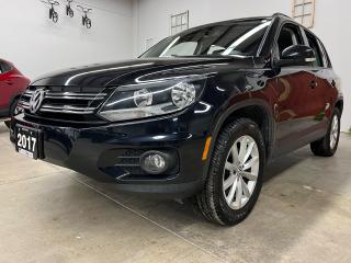 <p>WOWOWOWWOW!  This is one hot ride!  This VW Tiguan is slick black on black Wolfsburg addition.  It is in fantastic shape and has lots of extras to write home about, lol...including leather, heated and power seats, push button start, auto headlights/wipers back up camera and is in EXCELLENT shape.  Clearly its previous owner was also obsessed and took good care of this baby.  Its got a clean accident history report and has been well maintained with lots of regular scheduled maintenance recorded - brakes have been recently done and this little spitfire is ready to hit the ground running - so to speak.  If you are interested, dont sit around on this one.</p><p>All Vehicles are Sold Certified and come with a 3 month/3,000 km 1-Star Powertrain Drive Global Warranty (extended warranties and coverages available). </p><p>At LuckyDog we believe in transparency, thats why all our vehicles come with a complete CarFax Vehicle report to ensure your not buying a salvaged or rebuilt vehicle. </p><p>* While every reasonable effort is made to ensure the accuracy of this information, some vehicle information may not be exactly as shown. </p>