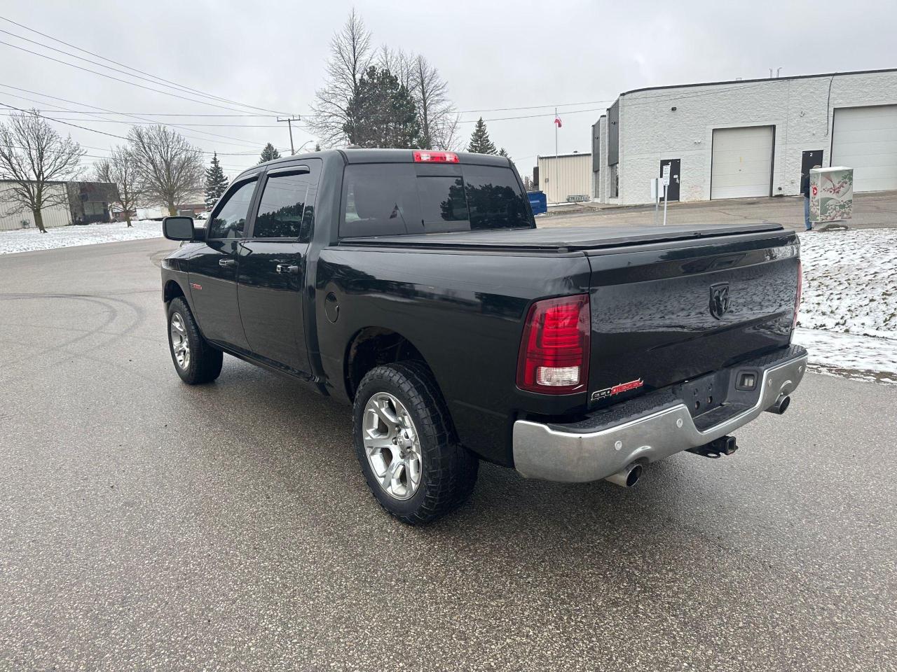 2015 RAM 1500 4WD Crew Cab 140.5" Laramie - Photo #4