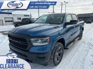 <b>5.7L V8 HEMI MDS VVT eTorque Engine, Built-to-Serve Edition, Bed Utility Group!</b><br> <br> <br> <br>  Beauty meets brawn with this rugged Ram 1500. <br> <br>The Ram 1500s unmatched luxury transcends traditional pickups without compromising its capability. Loaded with best-in-class features, its easy to see why the Ram 1500 is so popular. With the most towing and hauling capability in a Ram 1500, as well as improved efficiency and exceptional capability, this truck has the grit to take on any task.<br> <br> This night edge blue                Crew Cab 4X4 pickup   has a 8 speed automatic transmission and is powered by a  395HP 5.7L 8 Cylinder Engine.<br> <br> Our 1500s trim level is Big Horn. This Ram 1500 Bighorn comes with stylish aluminum wheels, a leather steering wheel, class II towing equipment including a hitch, wiring harness and trailer sway control, heavy-duty suspension, cargo box lighting, and a locking tailgate. Additional features include heated and power adjustable side mirrors, UCconnect 3, hands-free phone communication, push button start, cruise control, air conditioning, vinyl floor lining, and a rearview camera. This vehicle has been upgraded with the following features: 5.7l V8 Hemi Mds Vvt Etorque Engine, Built-to-serve Edition, Bed Utility Group. <br><br> View the original window sticker for this vehicle with this url <b><a href=http://www.chrysler.com/hostd/windowsticker/getWindowStickerPdf.do?vin=1C6SRFFT0RN214996 target=_blank>http://www.chrysler.com/hostd/windowsticker/getWindowStickerPdf.do?vin=1C6SRFFT0RN214996</a></b>.<br> <br>To apply right now for financing use this link : <a href=https://standarddodge.ca/financing target=_blank>https://standarddodge.ca/financing</a><br><br> <br/><br>* Visit Us Today *Youve earned this - stop by Standard Chrysler Dodge Jeep Ram located at 208 Cheadle St W., Swift Current, SK S9H0B5 to make this car yours today! <br> Pricing may not reflect additional accessories that have been added to the advertised vehicle<br><br> Come by and check out our fleet of 30+ used cars and trucks and 110+ new cars and trucks for sale in Swift Current.  o~o