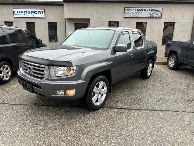 2014 Honda Ridgeline 4WD TOURING..LOW MILEAGE!! SOLD ! SOLD !