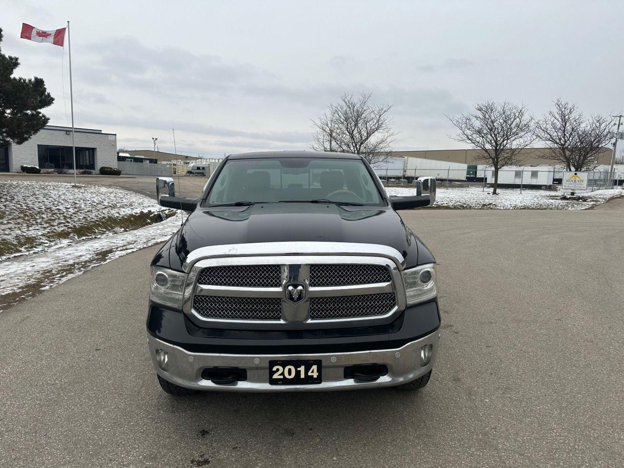 2014 RAM 1500 4WD Crew Cab 149" LARAMIE LONGHORN - Photo #4