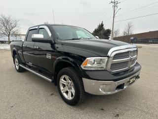 2014 RAM 1500 4WD Crew Cab 149" LARAMIE LONGHORN - Photo #6