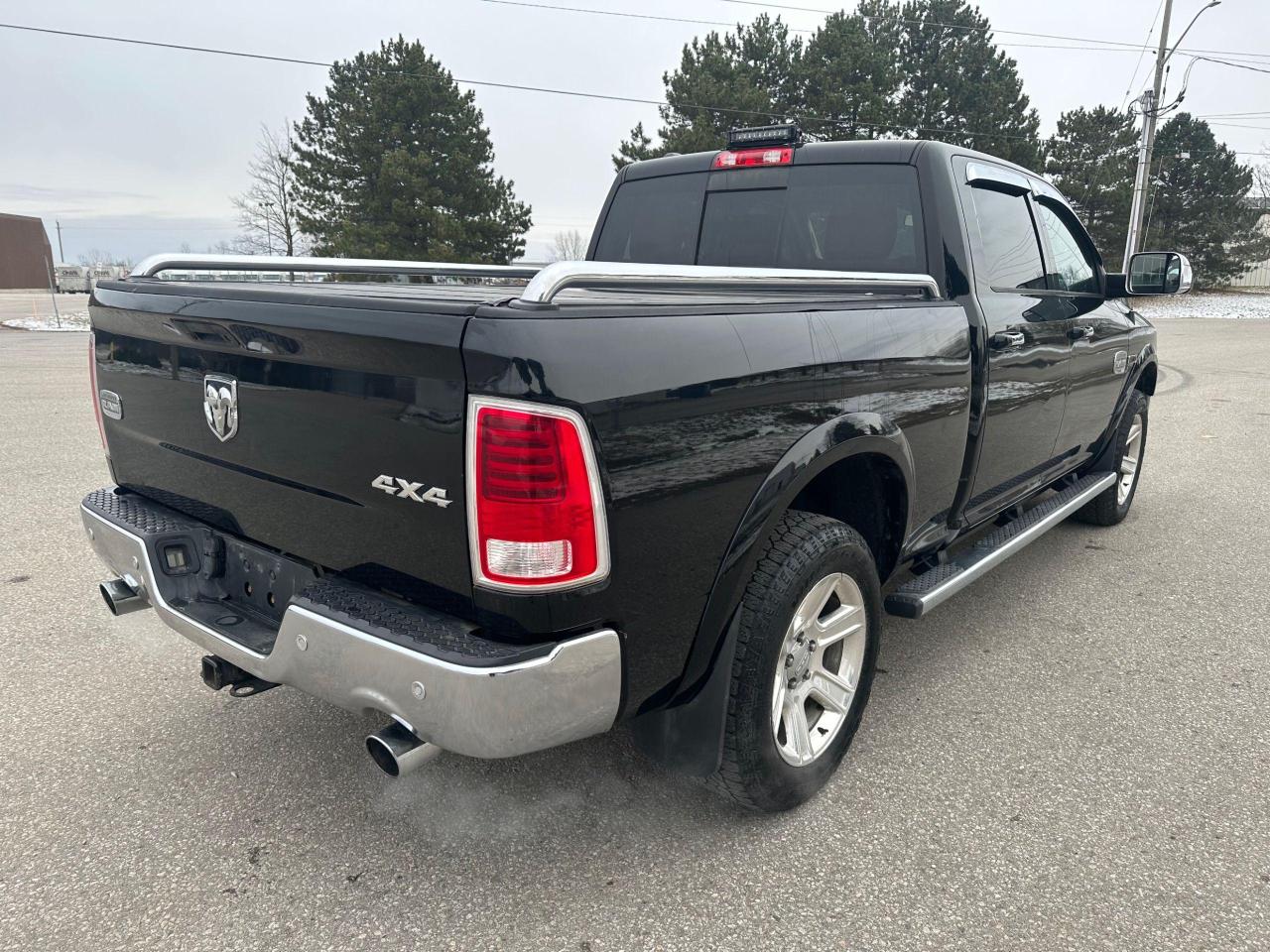 2014 RAM 1500 4WD Crew Cab 149" LARAMIE LONGHORN - Photo #8