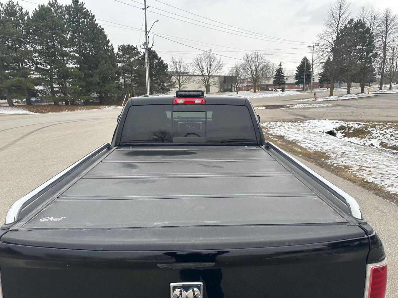 2014 RAM 1500 4WD Crew Cab 149" LARAMIE LONGHORN - Photo #20