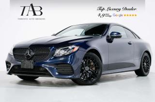This Beautiful 2018 Mercedes-Benz E-Class E400 is a local Ontario vehicle with a clean Carfax report. It is a luxury coupe known for its elegant design, advanced technology, and premium features.

Key Features Includes:

- Navigation
- Bluetooth
- Surround Camera System
- Sunroof 
- Heads up Display
- Burmester Sound System
- Sirius XM Radio
- Apple Carplay/Android Auto
- Front Heated and Ventilated Seats
- Front Massaging Seats
- Cruise Control
- Traffic Sign Assist
- Active Brake Assist
- Blind Spot Assist
- Active Lane Keep Assist
- MultiBeam LED Headlights
 

NOW OFFERING 3 MONTH DEFERRED FINANCING PAYMENTS ON APPROVED CREDIT.

Looking for a top-rated pre-owned luxury car dealership in the GTA? Look no further than Toronto Auto Brokers (TAB)! Were proud to have won multiple awards, including the 2023 GTA Top Choice Luxury Pre Owned Dealership Award, 2023 CarGurus Top Rated Dealer, 2024 CBRB Dealer Award, the Canadian Choice Award 2024, the 2023 Three Best Rated Dealer Award, and many more!

With 30 years of experience serving the Greater Toronto Area, TAB is a respected and trusted name in the pre-owned luxury car industry. Our 30,000 sq.Ft indoor showroom is home to a wide range of luxury vehicles from top brands like BMW, Mercedes-Benz, Audi, Porsche, Land Rover, Jaguar, Aston Martin, Bentley, Maserati, and more. And we dont just serve the GTA, were proud to offer our services to all cities in Canada, including Vancouver, Montreal, Calgary, Edmonton, Winnipeg, Saskatchewan, Halifax, and more.

At TAB, were committed to providing a no-pressure environment and honest work ethics. As a family-owned and operated business, we treat every customer like family and ensure that every interaction is a positive one. Come experience the TAB Lifestyle at its truest form, luxury car buying has never been more enjoyable and exciting!

We offer a variety of services to make your purchase experience as easy and stress-free as possible. From competitive and simple financing and leasing options to extended warranties, aftermarket services, and full history reports on every vehicle, we have everything you need to make an informed decision. We welcome every trade, even if youre just looking to sell your car without buying, and when it comes to financing or leasing, we offer same day approvals, with access to over 50 lenders, including all of the banks in Canada. Feel free to check out your own Equifax credit score without affecting your credit score, simply click on the Equifax tab above and see if you qualify.

So if youre looking for a luxury pre-owned car dealership in Toronto, look no further than TAB! We proudly serve the GTA, including Toronto, Etobicoke, Woodbridge, North York, York Region, Vaughan, Thornhill, Richmond Hill, Mississauga, Scarborough, Markham, Oshawa, Peteborough, Hamilton, Newmarket, Orangeville, Aurora, Brantford, Barrie, Kitchener, Niagara Falls, Oakville, Cambridge, Kitchener, Waterloo, Guelph, London, Windsor, Orillia, Pickering, Ajax, Whitby, Durham, Cobourg, Belleville, Kingston, Ottawa, Montreal, Vancouver, Winnipeg, Calgary, Edmonton, Regina, Halifax, and more.

Call us today or visit our website to learn more about our inventory and services. And remember, all prices exclude applicable taxes and licensing, and vehicles can be certified at an additional cost of $699.