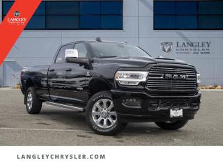 <p><strong><span style=font-family:Arial; font-size:18px;>Engrossed in the rhythm of the road, surrender to the magnetic allure of our automotive masterpiece - the 2024 RAM 3500 Laramie Pickup..</span></strong></p> <p><strong><span style=font-family:Arial; font-size:18px;>This brand new, never driven vehicle, cloaked in a sleek black exterior and matched with a luxurious black interior, is a testament to the perfect blend of power, luxury, and versatility..</span></strong> <br> Under the hood, the 6.7L 6-cylinder engine is ready to command the streets, delivering unparalleled performance and reliability.. With the precision of a 6-speed automatic transmission, you have the power to conquer any journey, and the confidence to do so with ease.</p> <p><strong><span style=font-family:Arial; font-size:18px;>Luxury is at the forefront of this RAM 3500, evident in the leather upholstery and the leather steering wheel, offering a touch of elegance to your everyday drive..</span></strong> <br> The automatic temperature control and front dual-zone A/C ensure a comfortable environment, while the auto-dimming rearview mirror and fully automatic headlights add convenience and safety to your drive.. Did you know that this vehicle is equipped with advanced safety features such as traction control, ABS brakes, and an array of airbags? Not only this, but with electronic stability and brake assist, this pickup ensures each journey is as safe as possible.</p> <p><strong><span style=font-family:Arial; font-size:18px;>The navigation system, tachometer, compass, and voice recorder are just a few of the state-of-the-art features that add to the functionality and convenience of this RAM 3500. With the trailer hitch receiver, your towing capacity is maximized, making it ideal for both work and play..</span></strong> <br> At Langley Chrysler, we believe in not just loving your car, but also loving the experience of buying it.. We offer a comprehensive range of options, and our team is dedicated to helping you find the perfect fit.</p> <p><strong><span style=font-family:Arial; font-size:18px;>With this brand new 2024 RAM 3500 Laramie, you dont just get a vehicle; you invest in a driving experience that stands out from the competition..</span></strong> <br> So why wait? Embrace the rhythm of the road and surrender to the magnetic allure of this automotive masterpiece.. Visit us at Langley Chrysler and let us help you make this brand new, never driven 2024 RAM 3500 Laramie Pickup yours today</p>Documentation Fee $968, Finance Placement $628, Safety & Convenience Warranty $699

<p>*All prices are net of all manufacturer incentives and/or rebates and are subject to change by the manufacturer without notice. All prices plus applicable taxes, applicable environmental recovery charges, documentation of $599 and full tank of fuel surcharge of $76 if a full tank is chosen.<br />Other items available that are not included in the above price:<br />Tire & Rim Protection and Key fob insurance starting from $599<br />Service contracts (extended warranties) for up to 7 years and 200,000 kms starting from $599<br />Custom vehicle accessory packages, mudflaps and deflectors, tire and rim packages, lift kits, exhaust kits and tonneau covers, canopies and much more that can be added to your payment at time of purchase<br />Undercoating, rust modules, and full protection packages starting from $199<br />Flexible life, disability and critical illness insurances to protect portions of or the entire length of vehicle loan?im?im<br />Financing Fee of $500 when applicable<br />Prices shown are determined using the largest available rebates and incentives and may not qualify for special APR finance offers. See dealer for details. This is a limited time offer.</p>
