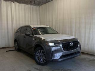 <p>NEW 2024 Mazda CX-90 PHEV GS-L AWD. Bluetooth, Mi-Drive, Leatherette Upholstery, Rear Parking Sensor, Captains Chairs, Panoramic Moonroof, Wireless Phone Charger, Wiper De-Icer, Roof Rails, Third Row Seating, 7-Seater, Heated Front Seats, Heated Steering Wheel, Electronic Parking Brake, Auto Hold, Power Trunk, Rear Climate Control, Tri-Zone Climate Control, 19 Silver Metallic Alloy Wheels, Text Message Us For More Info at 587-210-8409</p>  <p>Includes:</p>   <p>Standard on 2024 Mazda CX-90 i-ACTIVSENSE + Safety Features (Smart Brake Support-Front, Driver Attention Alert, Rear Cross Traffic Alert, Mazda Radar Cruise Control With Stop & Go, Emergency Lane Keeping with Road Keep Assist, Lane-Keep Assist System, Lane Departure Warning System, Blind Spot Monitoring, Distance & Speed Alert)</p>    <p>Enjoy the journey in our 2024 Mazda CX-90 PHEV GS-L AWD, which is comfortably capable in Machine Grey Metallic! Motivated by a Hybrid 2.5 Liter Inline 4 and an Electric Motor delivering 42 KM of range, totaling a combined 340hp to an 8 Speed Automatic transmission. This All Wheel Drive SUV also rides with Off-Road, Sport, and Towing Modes, and it sees nearly approximately 9.4L/100km on the highway. A refined design is another benefit of our CX-90. Check out its LED lighting, panoramic moonroof, hands-free liftgate, roof rails, and 19-inch alloy wheels.</p>  <p>Our CX-90 cabin treats your family to better travel with heated leatherette power front seats, second-row captains chairs, a folding third row, a leather-wrapped steering wheel, tri-zone automatic climate control, and keyless access/ignition. Digitally dominate daily errands and extraordinary adventures with a 10.25-inch color display, Android Auto/Apple CarPlay, a Commander controller, available NAV, wireless charging, and voice control.</p>  <p>Safety is paramount for Mazda, so youre protected by automatic braking, a rearview camera, adaptive cruise control, blind-spot monitoring, rear cross-traffic alert, lane-keeping assistance, and other smart technologies. Carefully crafted, our CX-90 PHEV GS-L AWD can be yours today! Save this Page and Call for Availability. We Know You Will Enjoy Your Test Drive Towards Ownership!</p>  <p>AMVIC Licensed Business</p>