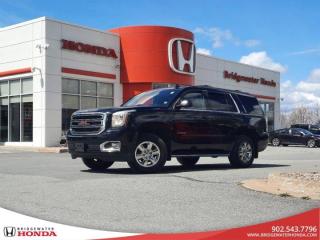 Black 2016 GMC Yukon SLT 4WD 6-Speed Automatic Electronic with Overdrive EcoTec3 5.3L V8 Bridgewater Honda, Located in Bridgewater Nova Scotia.4WD, 3rd row seats: split-bench, 5 Auxiliary 12-volt Power Outlets, ABS brakes, Adjustable pedals, Air Conditioning, AppLink/Apple CarPlay and Android Auto, Auto High-beam Headlights, Auto-dimming door mirrors, Auto-dimming Rear-View mirror, Automatic temperature control, Backup Camera, Black Assist Steps w/Chrome Strip, Bose Premium 9-Speaker System, Brake assist, Bumpers: body-colour, Compass, Delay-off headlights, Driver door bin, Dual front impact airbags, Dual front side impact airbags, Electronic Stability Control, Emergency communication system: OnStar Guidance, Enhanced Driver Alert Package, Forward Collision Alert Sensor Indicator, Front anti-roll bar, Front Bucket Seats, Front dual zone A/C, Front fog lights, Front reading lights, Front wheel independent suspension, Full-Feature Reclining Bucket Seats, Fully automatic headlights, Garage door transmitter, Hands Free Power Liftgate, Heated & Cooled Driver & Front Passenger Seats, Heated door mirrors, Heated rear seats, Heated steering wheel, Intellibeam Automatic High Beam On/Off Headlamps, Lane Keep Assist, Low tire pressure warning, Memory Package, Memory seat, Occupant sensing airbag, Outside temperature display, Overhead airbag, Overhead console, Panic alarm, Passenger door bin, Passenger vanity mirror, Passive Entry System, Pedal memory, Perforated Leather-Appointed Seat Trim, Power door mirrors, Power driver seat, Power Liftgate, Power passenger seat, Power Release 2nd Row 60/40 Split-Folding Bench Seat, Power steering, Power Tilt & Telescopic Steering Column, Power windows, Power-Adjustable Pedals For Accelerator & Brake, Premium Smooth Ride Suspension Package, Push Button Keyless Start, Rain sensing wipers, Rear air conditioning, Rear anti-roll bar, Rear Cross-Traffic Alert, Rear reading lights, Rear window defroster, Rear window wiper, Remote Keyless Entry, Remote keyless entry, Safety Alert Driver Seat, Security system, Side Blind Zone Alert w/Lane Change Alert, Speed control, Speed-sensing steering, Split folding rear seat, Spoiler, Steering wheel memory, Steering wheel mounted audio controls, Tachometer, Telescoping steering wheel, Tilt steering wheel, Traction control, Trip computer, Turn signal indicator mirrors, Unauthorized Entry Electrical Theft Deterrent Sys., Universal Home Remote, Variably intermittent wipers, Ventilated front seats, Voltmeter, Wheels: 18 x 8.5 Bright Machined Aluminum, Wireless Charging.
