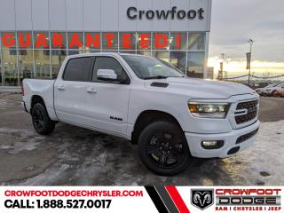<b>Sunroof, Night Edition, Running Boards, Blind Spot Detection, Trailer Hitch!</b><br> <br> <br> <br>  Beauty meets brawn with this rugged Ram 1500. <br> <br>The Ram 1500s unmatched luxury transcends traditional pickups without compromising its capability. Loaded with best-in-class features, its easy to see why the Ram 1500 is so popular. With the most towing and hauling capability in a Ram 1500, as well as improved efficiency and exceptional capability, this truck has the grit to take on any task.<br> <br> This bright white Crew Cab 4X4 pickup   has an automatic transmission and is powered by a  395HP 5.7L 8 Cylinder Engine.<br> <br> Our 1500s trim level is Sport. This RAM 1500 Sport throws in some great comforts such as power-adjustable heated front seats with lumbar support, dual-zone climate control, power-adjustable pedals, deluxe sound insulation, and a heated leather-wrapped steering wheel. Connectivity is handled by an upgraded 12-inch display powered by Uconnect 5W with inbuilt navigation, mobile internet hotspot access, smart device integration, and a 10-speaker audio setup. Additional features include power folding exterior mirrors, a power rear window with defrosting, class II towing equipment including a hitch, wiring harness and trailer sway control, heavy-duty suspension, cargo box lighting, and a locking tailgate. This vehicle has been upgraded with the following features: Sunroof, Night Edition, Running Boards, Blind Spot Detection, Trailer Hitch. <br><br> <br>To apply right now for financing use this link : <a href=https://www.crowfootdodgechrysler.com/tools/autoverify/finance.htm target=_blank>https://www.crowfootdodgechrysler.com/tools/autoverify/finance.htm</a><br><br> <br/>   <br> Buy this vehicle now for the lowest bi-weekly payment of <b>$534.80</b> with $0 down for 96 months @ 4.99% APR O.A.C. ( Plus GST  documentation fee    / Total Obligation of $111238  ).  Incentives expire 2024-02-29.  See dealer for details. <br> <br>We pride ourselves in consistently exceeding our customers expectations. Please dont hesitate to give us a call.<br> Come by and check out our fleet of 80+ used cars and trucks and 180+ new cars and trucks for sale in Calgary.  o~o