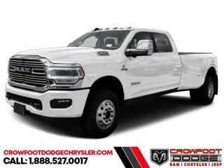 <b>Diesel Engine, Night Edition, Navigation, Remote Engine Start, Premium Audio!</b><br> <br> <br> <br>  Get the job done in comfort and style in this extremely capable Ram 3500 HD. <br> <br>Endlessly capable, this 2023 Ram 3500HD pulls out all the stops, and has the towing capacity that sets it apart from the competition. On top of its proven Ram toughness, this Ram 3500HD has an ultra-quiet cabin full of amazing tech features that help make your workday more enjoyable. Whether youre in the commercial sector or looking for serious recreational towing rig, this impressive 3500HD is ready for anything that you are.<br> <br> This bright white sought after diesel Crew Cab 4X4 pickup   has an automatic transmission and is powered by a Cummins 400HP 6.7L Straight 6 Cylinder Engine.<br> <br> Our 3500s trim level is Big Horn. This Ram 3500 Big Horn comes with stylish aluminum wheels, a leather steering wheel, extremely capable class V towing equipment including a hitch, brake controller, wiring harness and trailer sway control, heavy-duty suspension, cargo box lighting, and a locking tailgate. Additional features include heated and power adjustable side mirrors, UCconnect 3, hands-free phone communication, push button start, cruise control, air conditioning, vinyl floor lining, and a rearview camera. This vehicle has been upgraded with the following features: Diesel Engine, Night Edition, Navigation, Remote Engine Start, Premium Audio, 5th Wheel Gooseneck Towing Prep Group. <br><br> <br>To apply right now for financing use this link : <a href=https://www.crowfootdodgechrysler.com/tools/autoverify/finance.htm target=_blank>https://www.crowfootdodgechrysler.com/tools/autoverify/finance.htm</a><br><br> <br/> Total  cash rebate of $9450 is reflected in the price. Credit includes $9,450 Consumer Cash Discount. <br> Buy this vehicle now for the lowest bi-weekly payment of <b>$566.30</b> with $0 down for 96 months @ 6.49% APR O.A.C. ( Plus GST  documentation fee    / Total Obligation of $117790  ).  Incentives expire 2024-02-29.  See dealer for details. <br> <br>We pride ourselves in consistently exceeding our customers expectations. Please dont hesitate to give us a call.<br> Come by and check out our fleet of 80+ used cars and trucks and 180+ new cars and trucks for sale in Calgary.  o~o