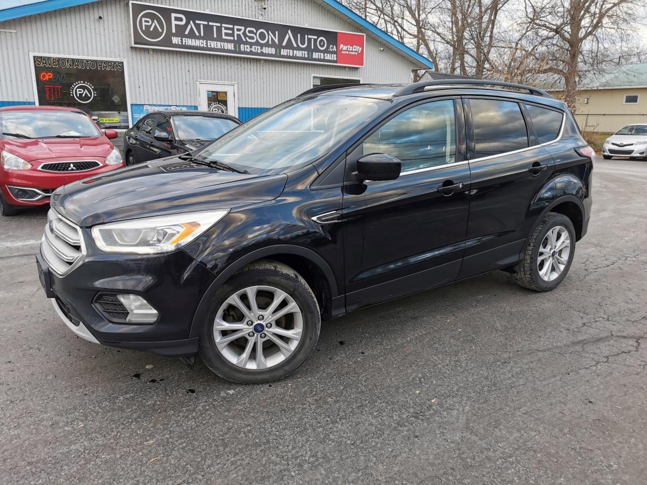 <p>LEATHER-HEATED LEATHER SEATS-FRONT WHEEL DRIVE Looking for a pre-owned SUV that combines style, comfort, and performance? Look no further than the 2018 Ford Escape SEL at Patterson Auto Sales! This sleek and spacious vehicle is equipped with luxurious leather seating for a premium driving experience. And under the hood, you'll find a powerful 1.5L L4 DOHC 16V engine, ready to take on any road with ease. Don't miss out on this incredible deal - come test drive the 2018 Ford Escape SEL today at Patterson Auto Sales!</p>