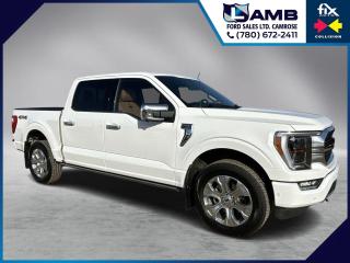 THE PRICE YOU SEE, PLUS GST. GUARANTEED!3.5 LITER ECOBOOST, PLATINUM TRIM, TWIN PANEL MOONROOF, INTERIOR WORK SURFACE, WIRELESS CHARGING PAD, SYNC 4.     The 2022 Ford F-150 Platinum with a 3.5-liter EcoBoost engine is a top-tier trim level of the legendary F-150 pickup truck. It combines luxury, innovation, and impressive performance.  The F-150 Platinum is powered by a 3.5-liter twin-turbocharged EcoBoost V6 engine. This engine delivers best-in-class 400 horsepower and 500 lb-ft of torque. It is mated to a 10-speed automatic transmission. The 2022 F-150 Platinum features a bold and commanding design with chrome accents and a distinctive front grille. It comes standard with LED lighting, including LED headlights, fog lights, and taillights. The Platinum trim is adorned with 20-inch polished aluminum wheels. The 2022 F-150 Platinum comes equipped with the latest technology features. It includes a 12-inch touchscreen infotainment system with Fords SYNC 4 interface, wireless Apple CarPlay, Android Auto, and built-in navigation. The truck also offers a 12-inch digital gauge cluster, a Bang & Olufsen sound system, and a range of available driver-assistance features such as blind-spot monitoring and lane-keeping assist.Do you want to know more about this vehicle, CALL, CLICK OR COME ON IN!*AMVIC Licensed Dealer; CarProof and Full Mechanical Inspection Included.