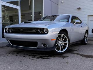 Turn heads in our 2021 Dodge Challenger GT takes center stage shown off in Triple Nickel with a Gloss Black! Its powered by a 3.6 Liter V6 engine that produces 292 horsepower while paired to a smooth-shifting 8-Speed automatic transmission.The hood scoop, dual exhaust, and rear spoiler heighten the sporty-vibe of this modern day muscle car!Inside our GT, settle into black cloth seating, grip the leather-wrapped heated steering wheel with mounted audio/Bluetooth/cruise controls and look over to see an 8.4-inch touchscreen. It also has front heated seats, anAM/FM radio thats XM radio ready, and an impressive sound system.Our Dodge gives you peace of mind with a variety of safety features including a backup camera, automatic headlights, rain-sensing windshield wipers, stability/traction control, 4-Wheel anti-locking braking system, a multitude of airbags and more! Print this page and call us Now... We Know You Will Enjoy Your Test Drive Towards Ownership! We look forward to showing you why Go Mazda is the best place for all your automotive needs.Go Mazda is an AMVIC licensed business.Please note: this vehicle was previously used as a Rental.