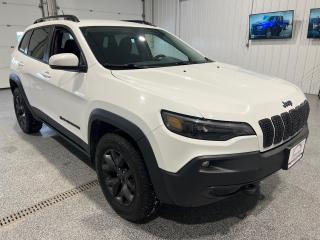 <div><b>Embark on your next journey with the robust 2020 Jeep Cherokee Sport Upland Edition 4X4, a vehicle that combines off-road readiness with contemporary aesthetics and technology. This used SUV, cloaked in a striking Bright White exterior, is built to conquer both city streets and untamed trails.</b></div><br /><div><b><br></b></div><br /><div><b>The heart of this Jeep Cherokee is a potent 3.2L V6 engine, delivering ample power for all your adventures. Its mated with a smooth 9-speed automatic transmission and equipped with Four-Wheel Drive, providing you with the confidence to tackle a variety of driving conditions. </b></div><br /><div><b><br></b></div><br /><div><b>Key features of this special edition SUV include:</b></div><br /><div><b><br></b></div><br /><div><b>- A distinctive interior with black cloth seats, highlighted by Viper Blue accent stitching, offering a unique and sporty cabin feel.</b></div><br /><div><b>- Rugged 17-inch black aluminum wheels paired with all-terrain tires that not only add to its aggressive look but also enhance off-road capability.</b></div><br /><div><b>- Exterior detailing that includes matte black tow hooks, desert sky blue badging, off-road wheel flares, and black roof rails and grill surrounds.</b></div><br /><div><b>- A full-size spare tire, providing peace of mind for those unexpected on-the-road challenges.</b></div><br /><div><b>- LED fog lamps to illuminate the path ahead during low-visibility conditions.</b></div><br /><div><b>- ParkSense rear park assist system and rear backup camera, making parking and reversing much safer and more convenient.</b></div><br /><div><b>- Advanced safety features such as blind-spot monitoring and rear cross-path detection to keep you aware of your surroundings.</b></div><br /><div><b><br></b></div><br /><div><b>Keeping comfort in mind, the Cherokee Sport Upland is equipped with:</b></div><br /><div><b><br></b></div><br /><div><b>- Heated front seats and a heated steering wheel for those chilly mornings.</b></div><br /><div><b>- A remote start system that allows you to warm up or cool down your vehicle before you get in.</b></div><br /><div><b>- Windshield wiper de-icer, maintaining clear visibility in frosty weather.</b></div><br /><div><b><br></b></div><br /><div><b>For towing and hauling capabilities, the Jeep Cherokee Sport Upland includes:</b></div><br /><div><b><br></b></div><br /><div><b>- A comprehensive trailer tow group with heavy-duty cooling, a trailer tow wiring harness, and a class III hitch receiver, making it ready to transport whatever you need for your adventure.</b></div><br /><div><b><br></b></div><br /><div><b>Technology is not overlooked in this SUV:</b></div><br /><div><b><br></b></div><br /><div><b>- A 7-inch touchscreen display that supports both Android Auto and Apple CarPlay, allowing for easy smartphone integration.</b></div><br /><div><b>- GPS Navigation to help you find your way to any destination effortlessly.</b></div><br /><div><b>- Additional features like power windows, a telescopic steering wheel, cruise control, and anti-lock brakes ensure a balanced mix of convenience and safety.</b></div><br /><div><b><br></b></div><br /><div><b>Fuel efficiency is respectable for its class, with an estimated 12.2L/100km in the city and 8.6L/100km on the highway.</b></div><br /><div><b><br></b></div><br /><div><b>This used 2020 Jeep Cherokee Sport Upland 4X4 is more than just a rugged and capable SUV; its a versatile vehicle thats ready for your everyday commute or your most adventurous escapades. It even comes with the remainder of the Jeep Powertrain warranty valid until November 2025 or 100,000 kms, adding an extra layer of confidence to your purchase.</b></div><br /><div><b><br></b></div><br /><div><b>At Sisson Auto, the buying experience is designed to be seamless and stress-free, with transparent pricing and a host of customer-focused policies such as a 3-day/600 km return policy, a 30-day exchange privilege, and complimentary roadside assistance. A history report from CarFax is also provided for full transparency. </b></div><br /><div><b>** This description was written by AI based on information provided about the vehicle. AI can sometimes produce incorrect information. Please confirm all details with the dealership. </b></div>