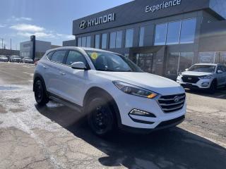 <p> Take the worry out of buying with this impeccable 2018 Hyundai Tucson. Side Impact Beams, Rear Child Safety Locks, Outboard Front Lap And Shoulder Safety Belts -inc: Rear Centre 3 Point, Height Adjusters and Pretensioners, Electronic Stability Control (ESC), Dual Stage Driver And Passenger Seat-Mounted Side Airbags. </p> <p><strong> Reliability Recognized for This Hyundai Tucson </strong><br /> KBB.com 10 Best SUVs Under $25,000, KBB.com 5-Year Cost to Own Awards, KBB.com 10 Most Awarded Brands. </p> <p><strong>Fully-Loaded with Additional Options</strong><br>WINTER WHITE, BLACK, CLOTH SEAT TRIM, Wheels: 17 x 7.0J Steel, Wheels w/Full Wheel Covers, Variable Intermittent Wipers w/Heated Wiper Park, Urethane Gear Shifter Material, Trip Computer, Transmission: 6-Speed Automatic w/OD -inc: lock-up torque converter and electronic shift lock system, Transmission w/SHIFTRONIC Sequential Shift Control, Tires: P225/60R17 All-Season.</p> <p><strong> Visit Us Today </strong><br> Stop by Experience Hyundai located at 15 Mount Edward Rd, Charlottetown, PE C1A 5R7 for a quick visit and a great vehicle!</p>