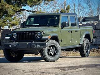 Our New 2024 Jeep Gladiator Willys 4X4 with the Convenience Pack honors one of Jeeps founding fathers with fantastic capability in Sarge Green! Motivated by a 3.6 Litre Pentastar V6 serving up 285hp to an 8 Speed Automatic transmission for impressive tow/payload ratings. An Off-Road Plus mode, Dana axles, and Command-Trac 4WD come together for Trail Rated performance, and it returns approximately 10.7L/100km on the highway. Strong and ready to stand out, our Gladiator boasts LED lighting, fog lamps, a black 3-piece Freedom hardtop, dramatic decals, robust skid plates, a padded sport bar, a Gorilla Glass windshield, cab rock rails, and alloy wheels for a look that owners love.  Explorers can also appreciate our comfortable Willys cabin, which welcomes our Convenience Pack to add heated cloth front seats, a heated-wrapped steering wheel, and remote start to automatic climate control, programmable auxiliary switches, and keyless entry/ignition. Off-Road Info Pages unlocks trail-friendly technology to complement a 12.3-inch touchscreen, a 7-inch driver display, WiFi/Alexa compatibility, voice control, Apple CarPlay®, Android Auto®, Bluetooth®, and an eight-speaker sound system.  Jeep safeguards your travel with adaptive cruise control, automatic braking, a rearview camera, forward collision warning, hill-start assist, stability/traction control, trailer sway control, and more. Our Gladiator Willys is designed to meet difficult demands with ease! Save this Page and Call for Availability. We Know You Will Enjoy Your Test Drive Towards Ownership!
