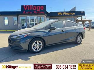 <b>Heated Seats,  Touch Screen,  Rear View Camera,  Bluetooth,  SiriusXM!</b><br> <br> We sell high quality used cars, trucks, vans, and SUVs in Saskatoon and surrounding area.<br> <br>   With ultra low gas consumption, a stylish cabin and a roomy interior, the 2017 Chevrolet Cruze is a top choice in the small sedan segment. This  2017 Chevrolet Cruze is for sale today. <br> <br>Whether youre zipping around city streets or navigating winding roads, the new 2017 Cruze is made to work hard for you. With a unique combination of entertainment technology, remarkable efficiency and advanced safety features, this sporty compact car helps you get where youre going without missing a beat. This  sedan has 143,506 kms. Its  grey in colour  . It has a 6 speed automatic transmission and is powered by a  153HP 1.4L 4 Cylinder Engine.  It may have some remaining factory warranty, please check with dealer for details. <br> <br> Our Cruzes trim level is LT. The LT has numerous convenience and sporty features including aluminum wheels, LED daytime running lights, heated mirrors, a 6 speaker audio system, SiriusXM, heated seats and much, much more.  The LT also includes all the features from the Cruze LS, such as touch screen audio, air conditioning, Bluetooth, a rear view camera and plenty more.  This vehicle has been upgraded with the following features: Heated Seats,  Touch Screen,  Rear View Camera,  Bluetooth,  Siriusxm,  Aluminum Wheels. <br> <br>To apply right now for financing use this link : <a href=https://www.villageauto.ca/car-loan/ target=_blank>https://www.villageauto.ca/car-loan/</a><br><br> <br/><br> Buy this vehicle now for the lowest bi-weekly payment of <b>$114.43</b> with $0 down for 84 months @ 5.99% APR O.A.C. ( Plus applicable taxes -  Plus applicable fees   ).  See dealer for details. <br> <br><br> Village Auto Sales has been a trusted name in the Automotive industry for over 40 years. We have built our reputation on trust and quality service. With long standing relationships with our customers, you can trust us for advice and assistance on all your motoring needs. </br>

<br> With our Credit Repair program, and over 250 well-priced vehicles in stock, youll drive home happy, and thats a promise. We are driven to ensure the best in customer satisfaction and look forward working with you. </br> o~o