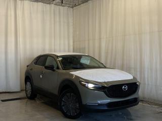 <p>NEW 2024 CX-30 Suna AWD. Bluetooth, Skyactiv-G 2.5 T (Inline-4) Dynamic Pressure Turbo (DPT), Zircon Sand Metallic Colour, Terracotta/Black Leatherette with Terracotta stitching, 360° Cam, Available NAV, Wireless Phone Charger, Type C USB Ports, Wireless Apple CarPlay & Android Auto, Memory Driver Seat, Heated Seats, Bose Premium Sound System, Garage Door Opener, Parking Sensors, Advanced Keyless Remote Entry, Power Trunk, Adaptive Cruise Control, Heated Steering Wheel, Auto Rain-Sensing Wipers, Electronic Parking Brake, Heated Mirrors, Auto-Dual Zone Climate Control, Rear Air Vents, 18 Black Finish Alloy Wheels</p>  <p>Includes:</p> <p>Skyactiv-G 2.5 Turbo Engine (Inline-4) Dynamic Pressure Turbo (DPT)</p>  <p>i-ACTIVSENSE + Safety Features (Smart City Brake Support-Front, Day/Night Forward Pedestrian Detection, Driver Attention Alert, Rear Cross Traffic Alert, Mazda Radar Cruise Control With Stop & Go, Distance Recognition Support System, Lane-Keep Assist System, Lane Departure Warning System, Advanced Blind Spot Monitoring)</p>  <p>Our dynamic 2024 Mazda CX-30 GT Suna AWD can deliver terrific thrills in a Zircon Sand Metallic Colour! Powered by a TurboCharged 2.5 Liter 4 Cylinder that delivers 250hp to a paddle-shifted 6 Speed Automatic transmission for aggressive acceleration. This All Wheel Drive SUV is also eager to explore, thanks to Off-road Traction Assist, and it sees nearly approximately 7.1L/100km on the highway. Sweeping lines emphasize the sporty nature of our spirited CX-30, which has signature LED lighting, a power sunroof, a power liftgate, a gloss-black grille, and bold alloy wheels.</p>  <p>A simple yet refined look awaits in our Suna cabin with heated leatherette front sport seats, eight-way power for the driver, a leather heated steering wheel, dual-zone automatic climate control, and keyless access/ignition. You can also enjoy easy access to connections, directions, and tunes with a central display, available full-color navigation, a Commander controller, Android Auto, Apple CarPlay, Bluetooth, voice recognition, and a Bose audio system with gloss-painted speaker grilles.</p>  <p>Mazda helps seal the deal with smart safety from adaptive cruise control, automatic braking, rear cross-traffic alert, a rearview camera, lane-departure warning, a blind-spot monitor, a driver attention monitor, and more. A leading choice for style and drivability, our CX-30 Suna awaits! Save this page, Come in for a Qualified Test Drive! We Know You Will Enjoy Your Test Drive Towards Ownership!</p>  <p>Call 587-409-5859 for more info or to schedule an appointment! Listed Pricing is valid for 72 hours. Financing is available, please see dealer for term availability and interest rates. AMVIC Licensed Business.</p>