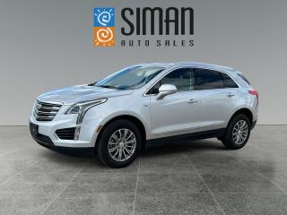 <p><strong>CLEARANCE PRICED ACCIDENT FREE EXCELLENT CONDITION</strong></p>

<p>Our 2019 Cadilac XT5 Luxury has been through a <strong>presale inspection, fresh full synthetic oil service. Includes a set of winter tires as well as all season.Carfax reports Accident free. Financing Available on site Trades Encouraged, aftermarket warranties available to fit every need and budget. </strong>With a striking interior and exterior design, the 2019 Cadillac XT5 stands out from its more conservatively styled rivals. Its broad, angular front end and finlike taillights echo classic Caddy themes, while vertical LED accent lights reinforce that the XT5 is very much a modern Cadillac made for todays crossover world. Its also bigger and more substantial than many of the compact luxury SUVs it frequently gets compared to, making it a sort of in-between choice in terms of size, stature and price. For 2019, the XT5 adds certain safety aids such as automatic emergency braking, lane keeping assist and adaptive cruise control as standard features on upper trims (previously they were options). New wheel designs and upgraded wireless phone charging round out the updates. Luxury trim upgrades include a panoramic sunroof, front parking sensors, rear cross-traffic alert and blind-spot monitoring, power-folding and driver-side auto-dimming mirrors, automatic wipers, leather upholstery, heated front seats with adjustable lumbar and eight-way passenger adjustment, a heated steering wheel, driver-seat memory settings, wireless smartphone charging, and a cargo management system. Now standard for 2019 are safety aids such as forward collision alert, lane departure warning, lane keeping assist, and GMs unique Safety Alert seat, which vibrates to warn of potential collisions to the left or right side of the car. Premium Luxury trim adds the above Luxury options plus 20-inch wheels, ventilated front seats, interior accent lighting, and an adaptive suspension that constantly adjusts to road conditions.</p>

<p><span style=color:#2980b9><strong>Siman Auto Sales is large enough to make a difference but small enough to care. We are family owned and operated, and have been proudly serving Saskatchewan car buyers since 1998. We offer on site financing, consignment, automotive repair and over 90 preowned vehicles to choose from.</strong></span></p>